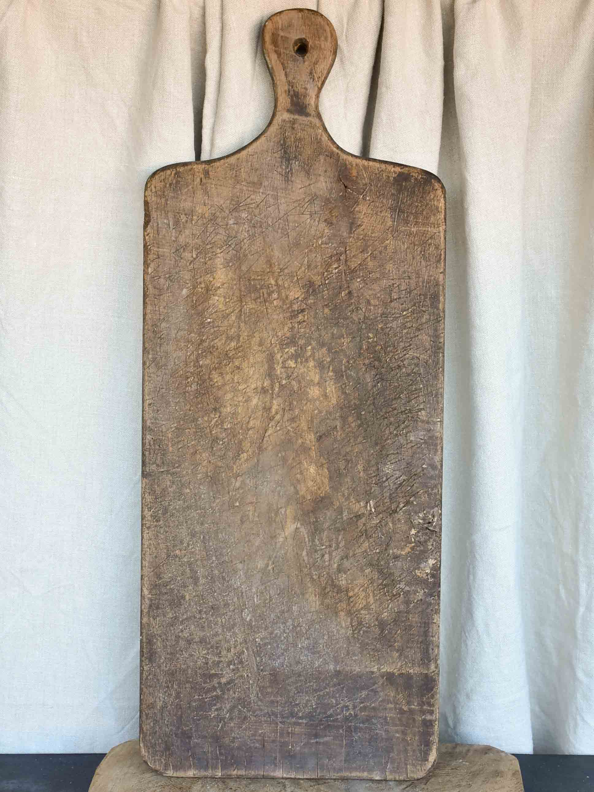Very large antique French cutting board - puzzle piece silhouette 29 ½''