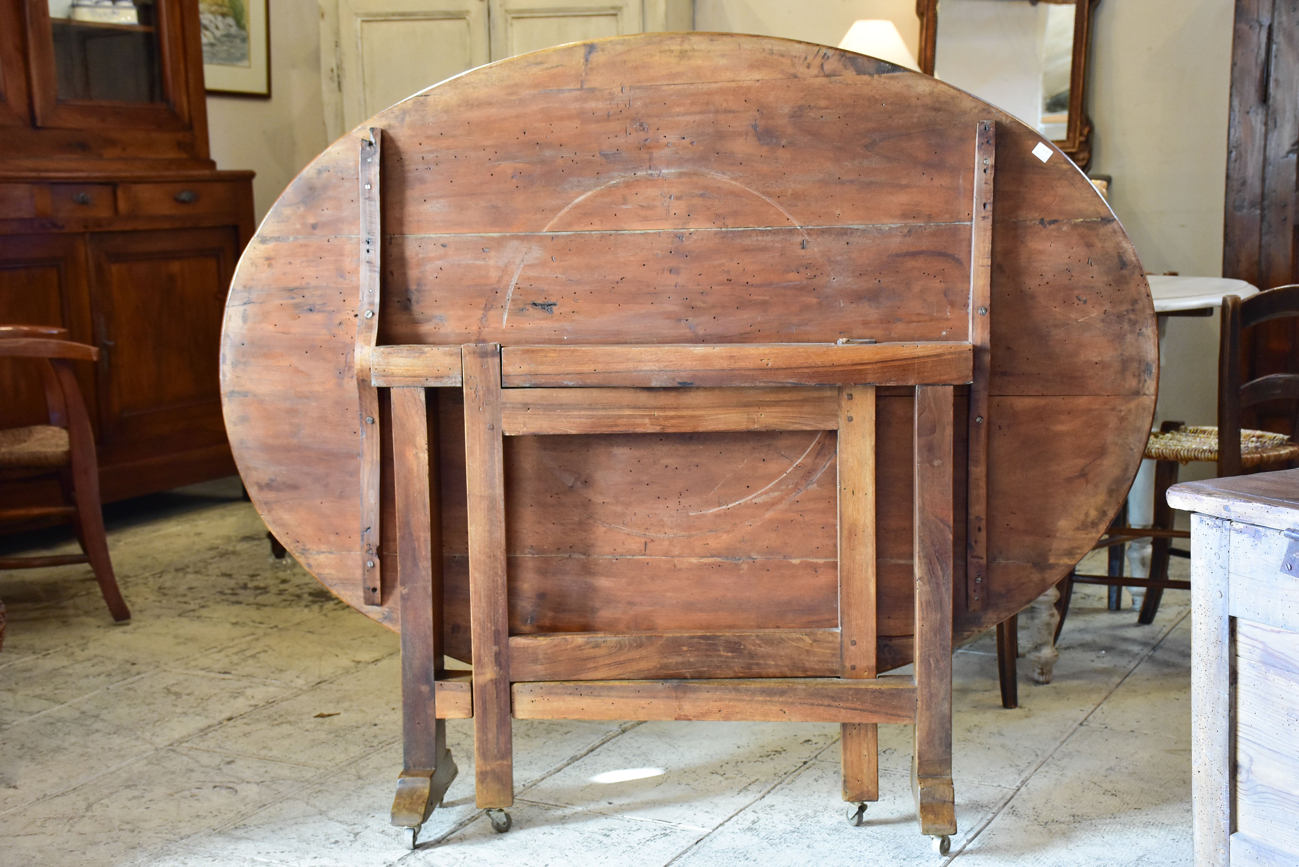 Antique French oval vigneron table