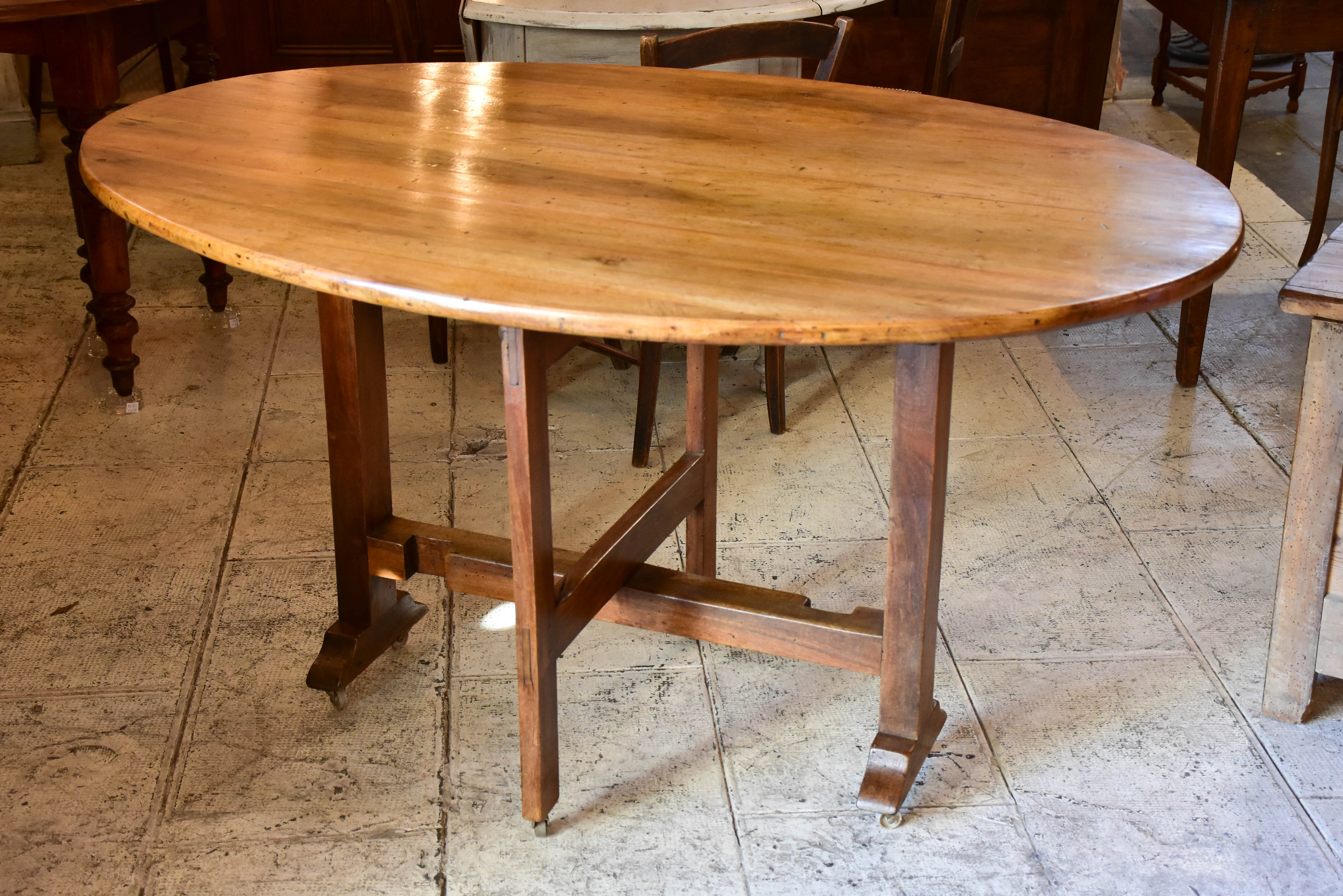 Antique French oval vigneron table
