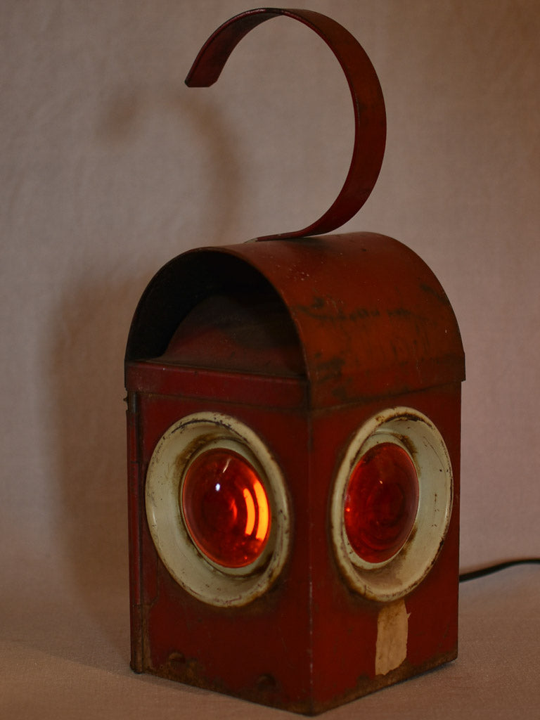 Aged railway lamp with handle