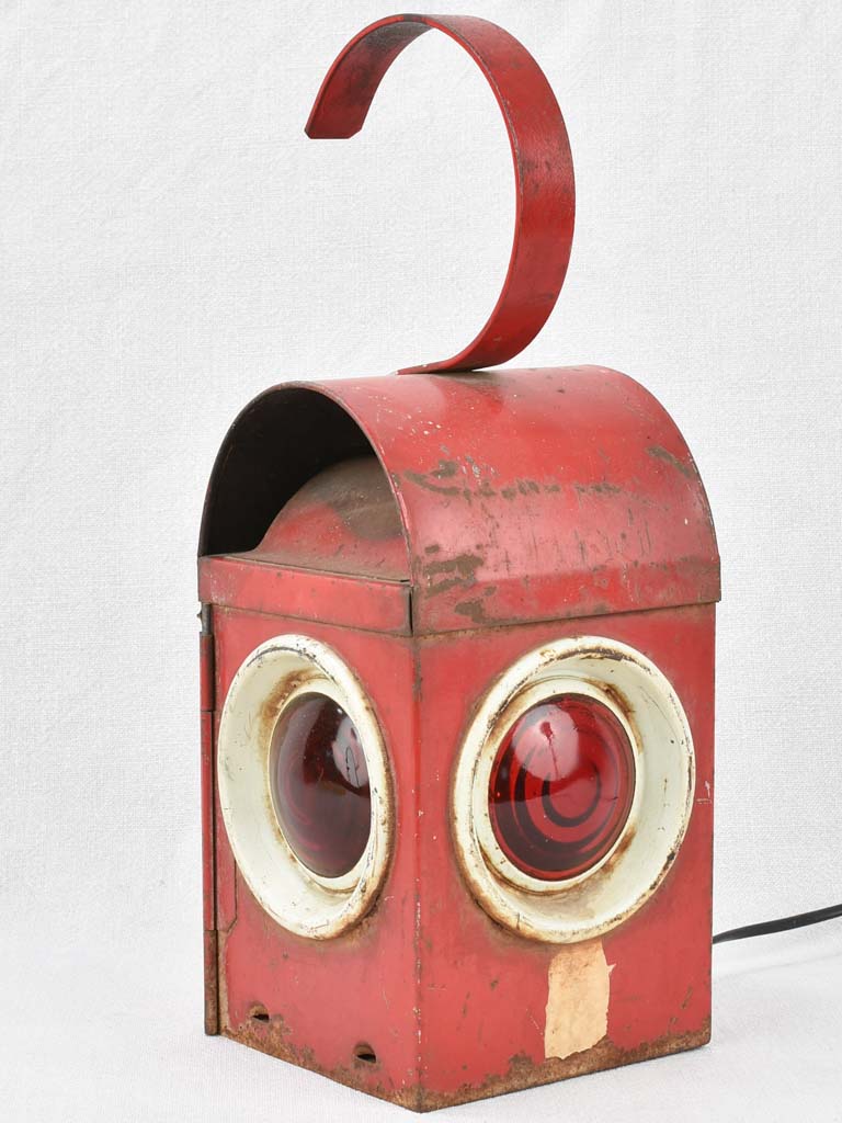 Antique red-glass railway signal lamp