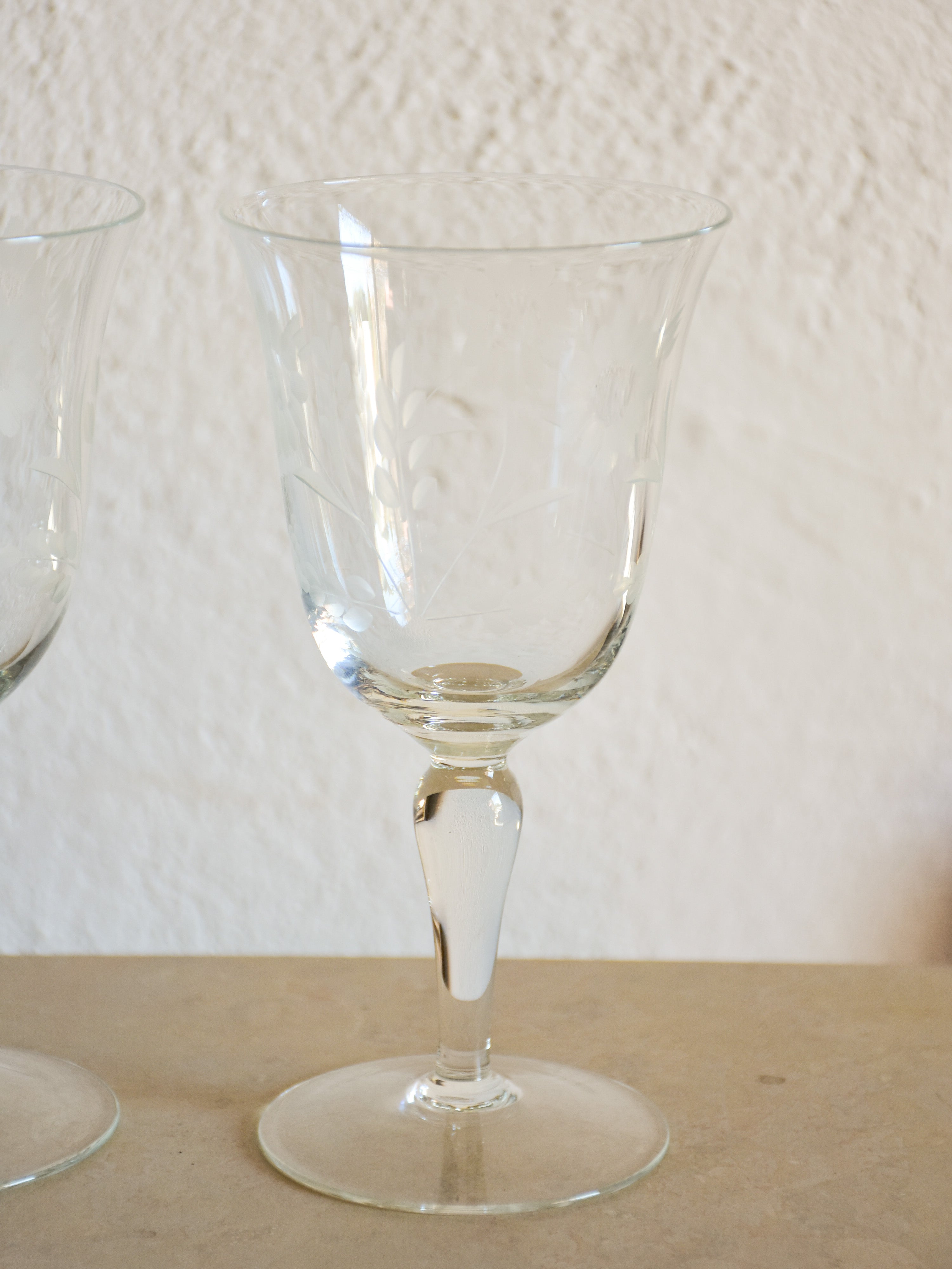 Set of eight vintage red wine glasses with decorative etchings