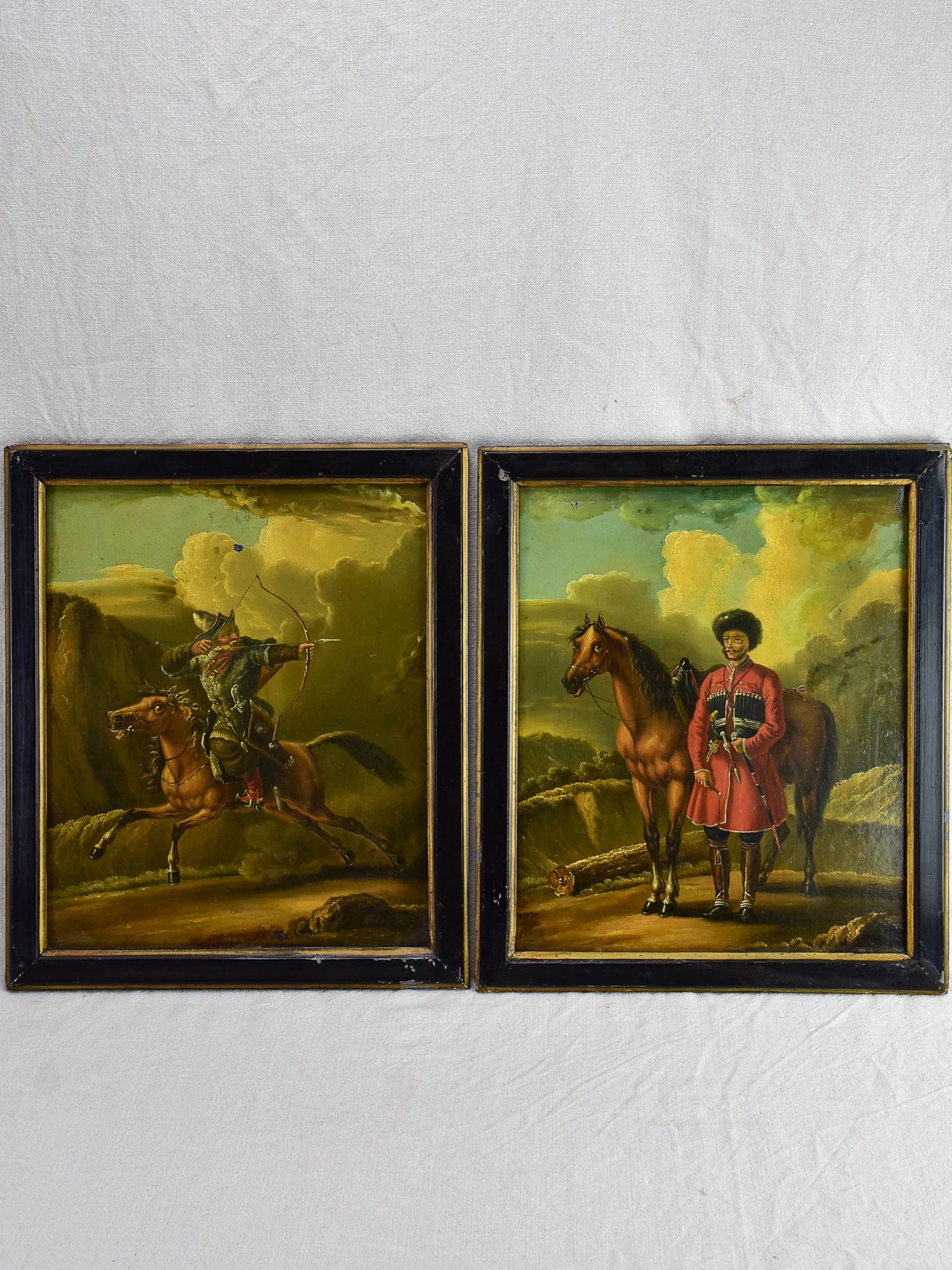 Rare pair of oil on tole paintings of military men on horseback 18" x 15¼"