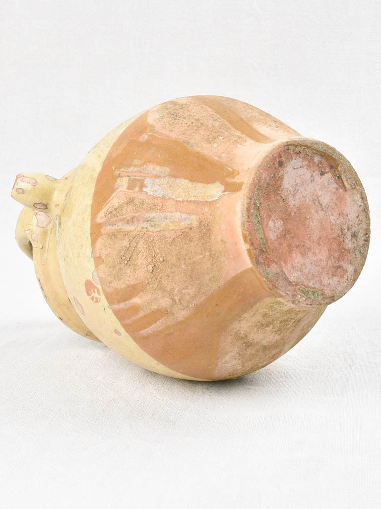 Antique French water pitcher with pale yellow glaze 13"