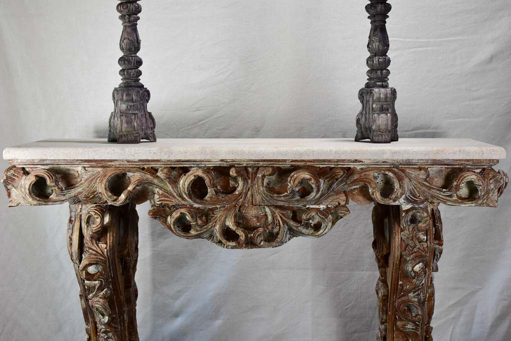 Magnificent carved console with travertine top 52" wide