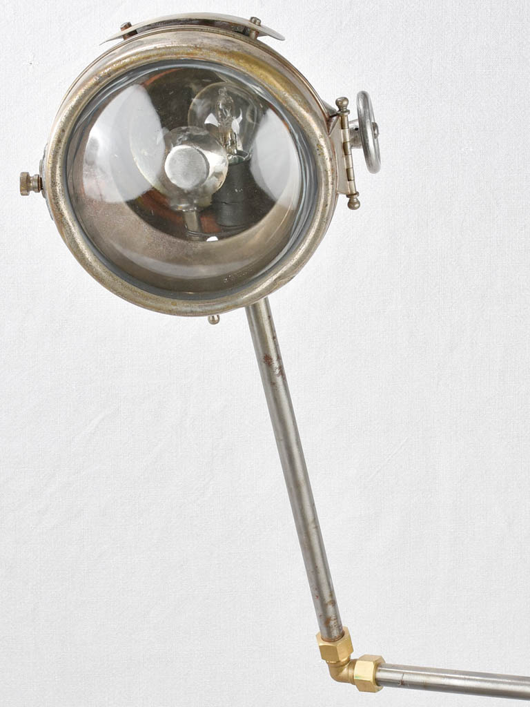 Salvaged pump and motorbike table lamp