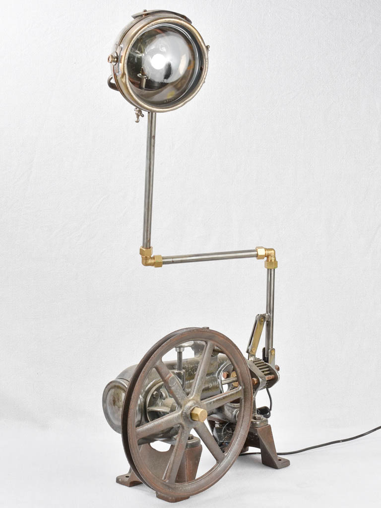 Salvaged pump and motorbike table lamp
