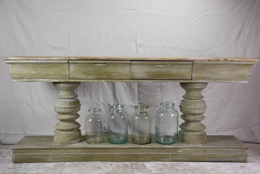 Narrow French console table with large turned column supports 78¾"