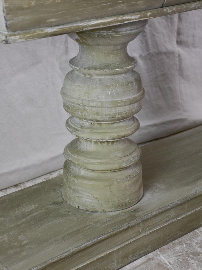 Narrow French console table with large turned column supports 78¾"