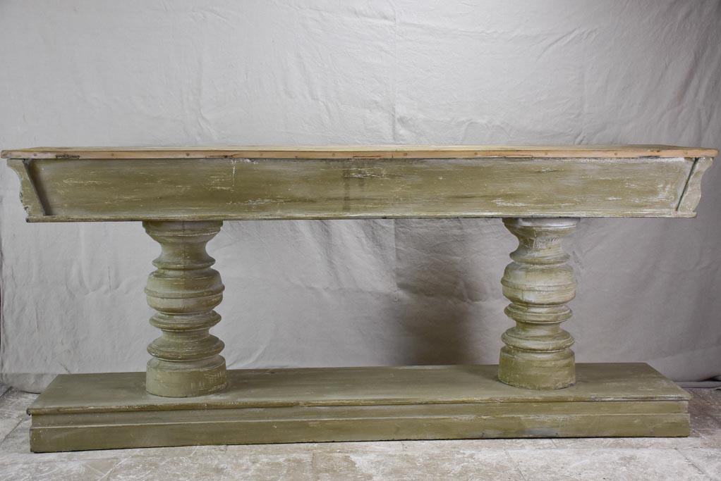 Narrow French console table with large turned column supports 78¾"