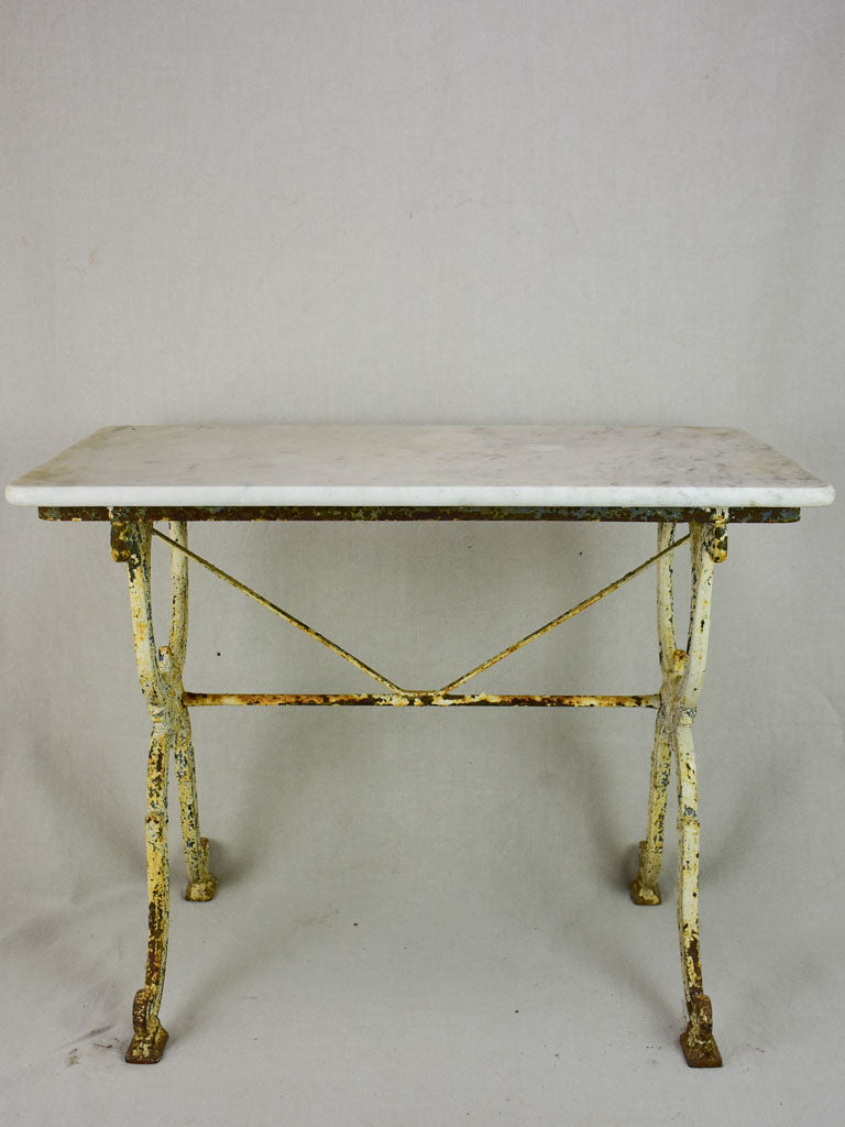 Early 20th Century rectangular garden table with marble top and patinated cast iron base 19¾" x 35½"
