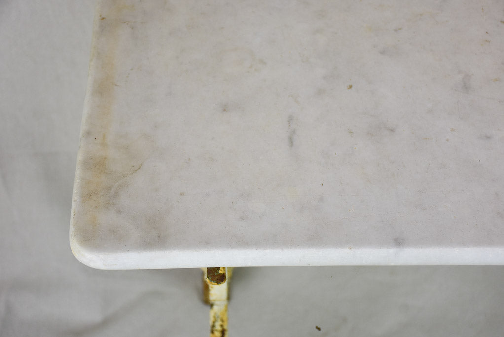 Early 20th Century rectangular garden table with marble top and patinated cast iron base 19¾" x 35½"