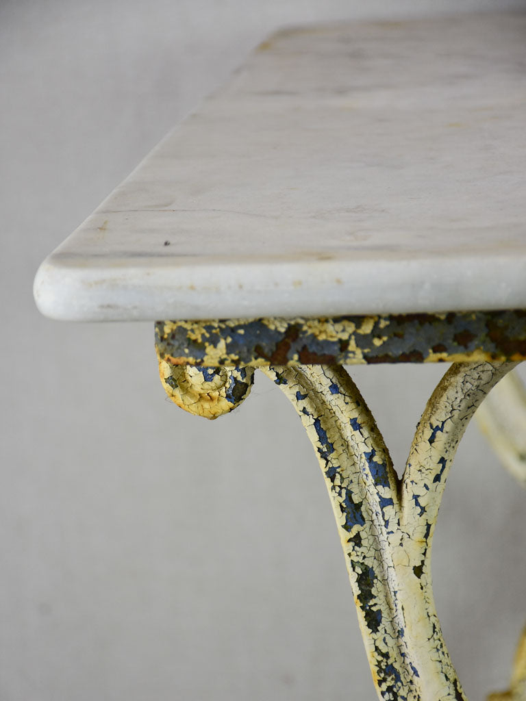 Early 20th Century rectangular garden table with marble top and patinated cast iron base 19¾" x 35½"