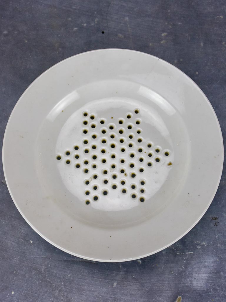Set of three Directoire fruit strainer plates with claw feet