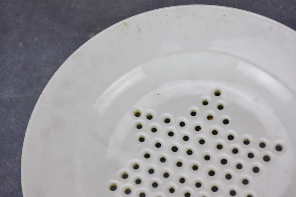 Set of three Directoire fruit strainer plates with claw feet