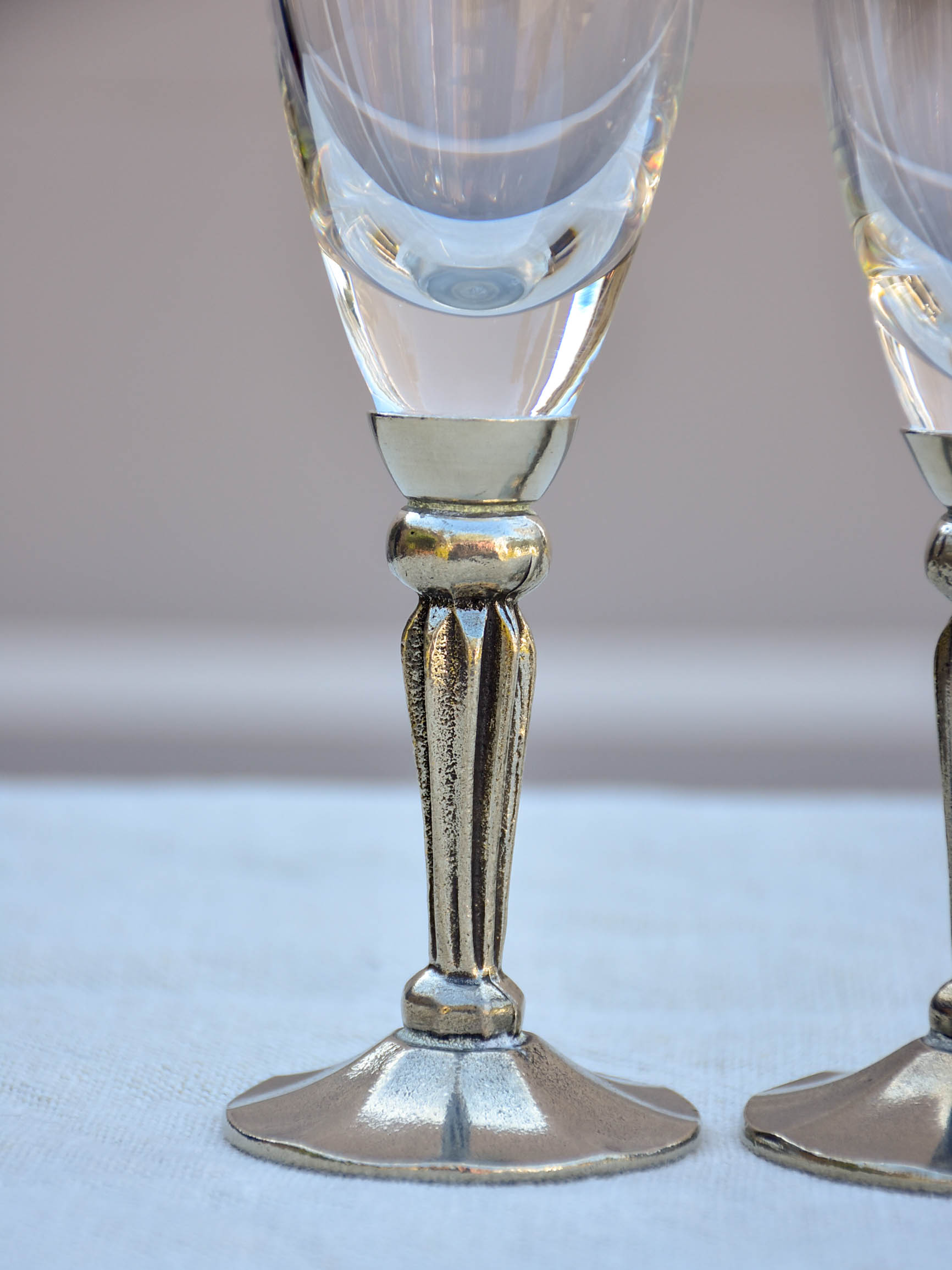 Six French mid-century crystal champagne flutes with pewter detail - signed