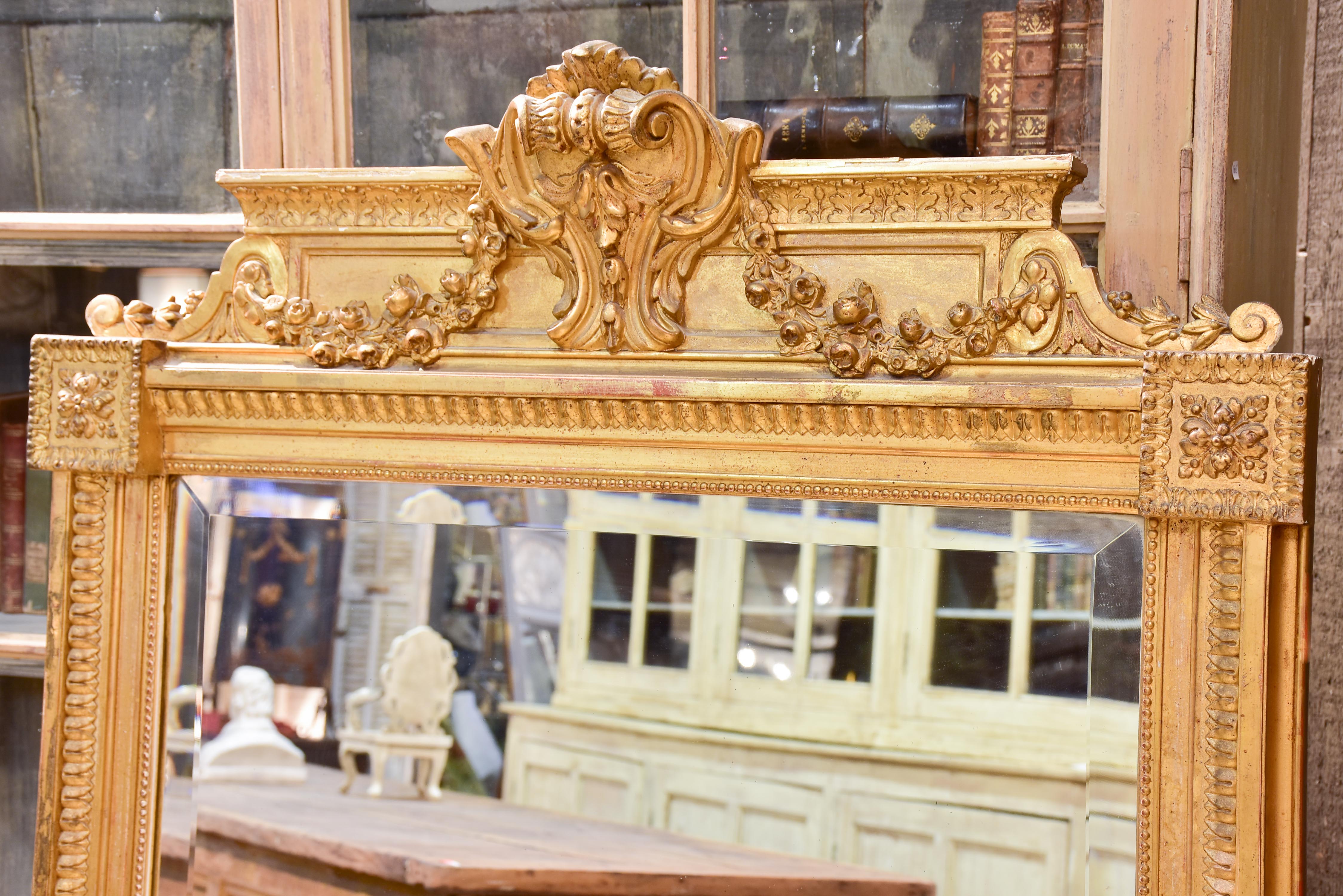 Antique French Napoleon III mirror with gilded frame and crest