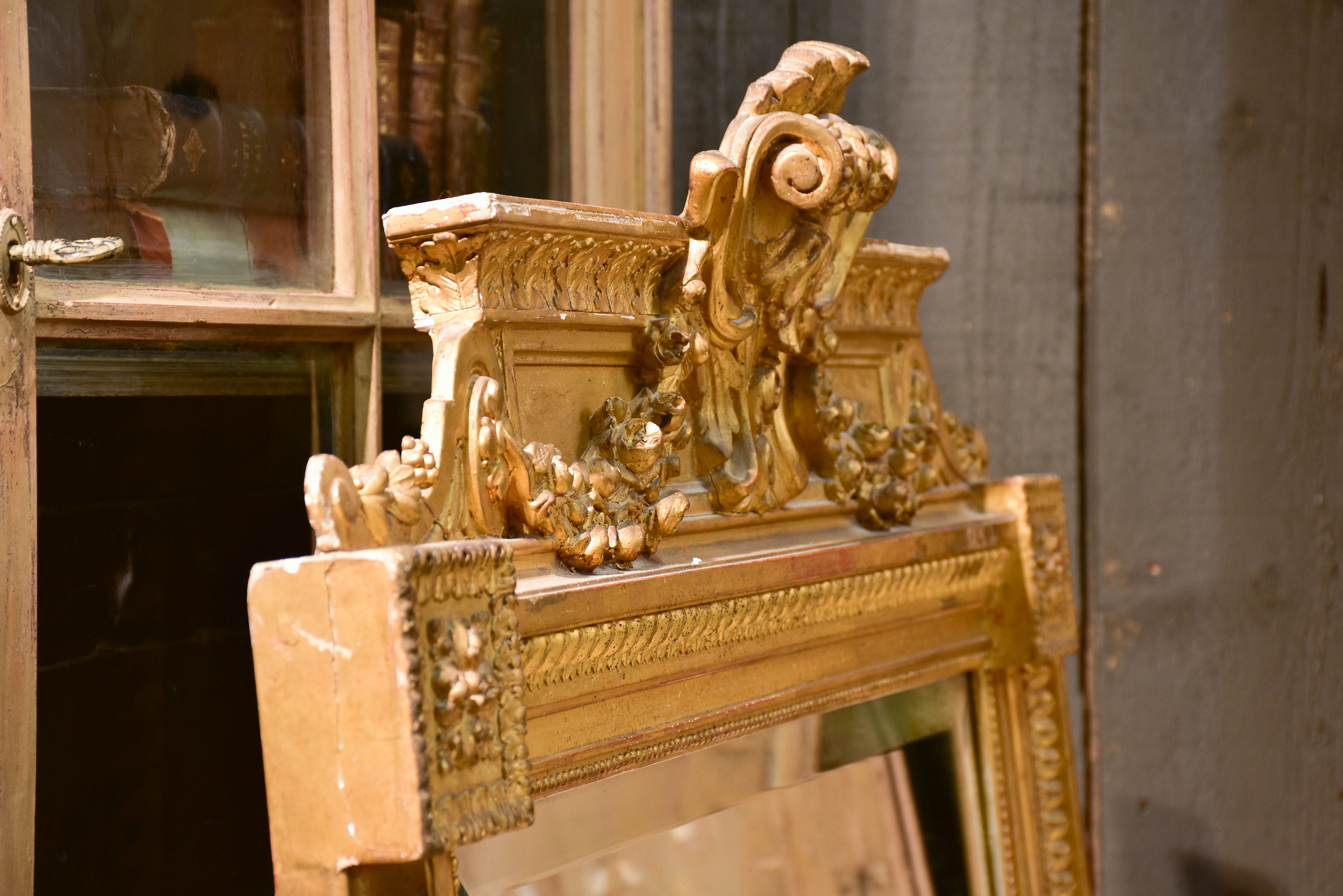 Antique French Napoleon III mirror with gilded frame and crest