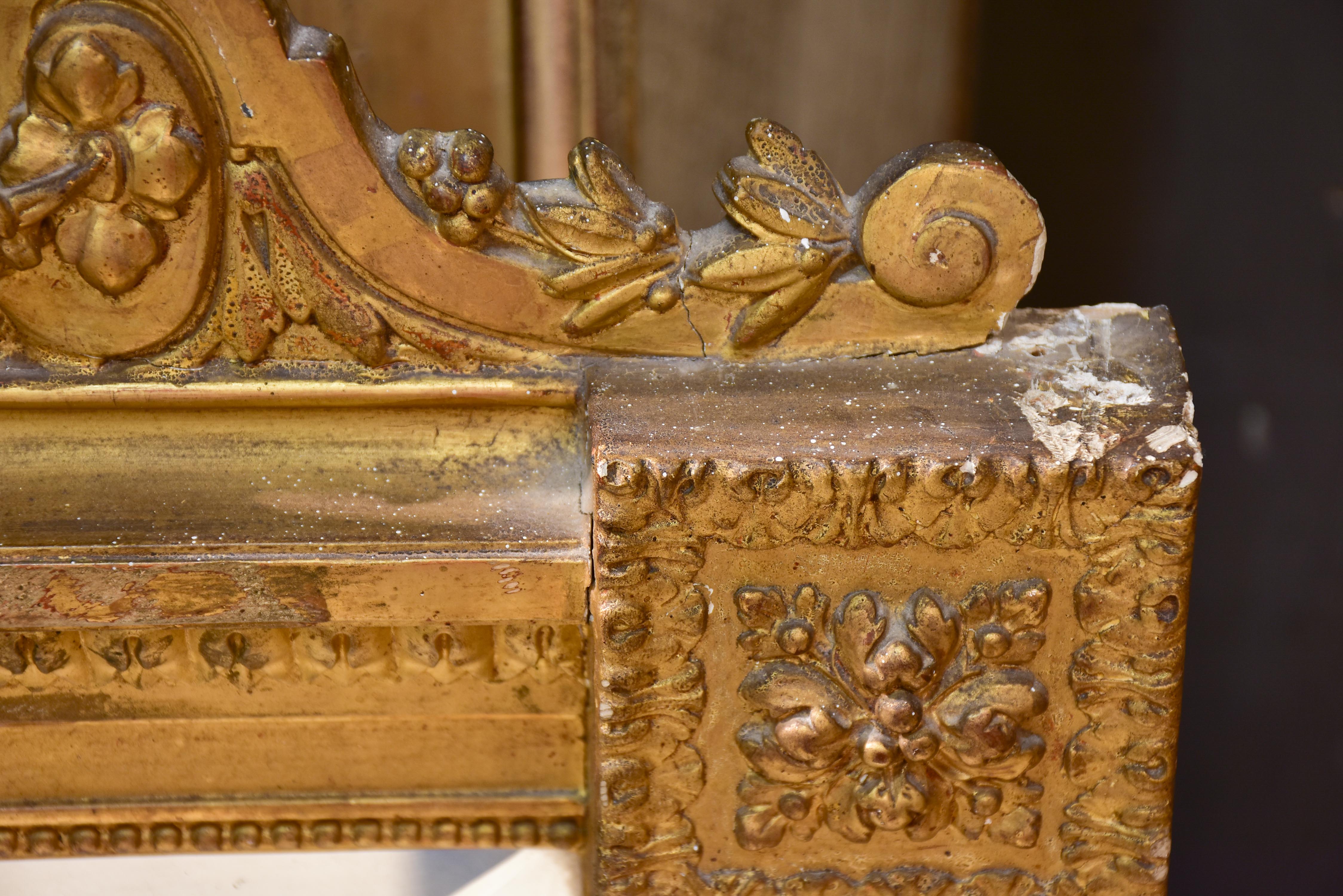 Antique French Napoleon III mirror with gilded frame and crest