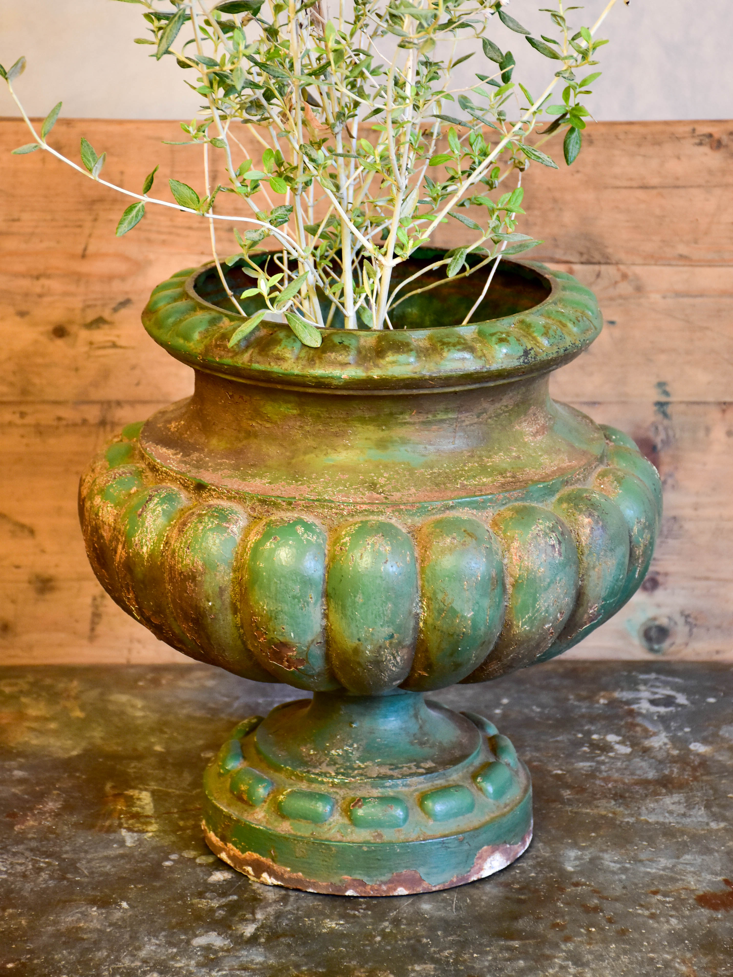 Antique French garden urn with green patina