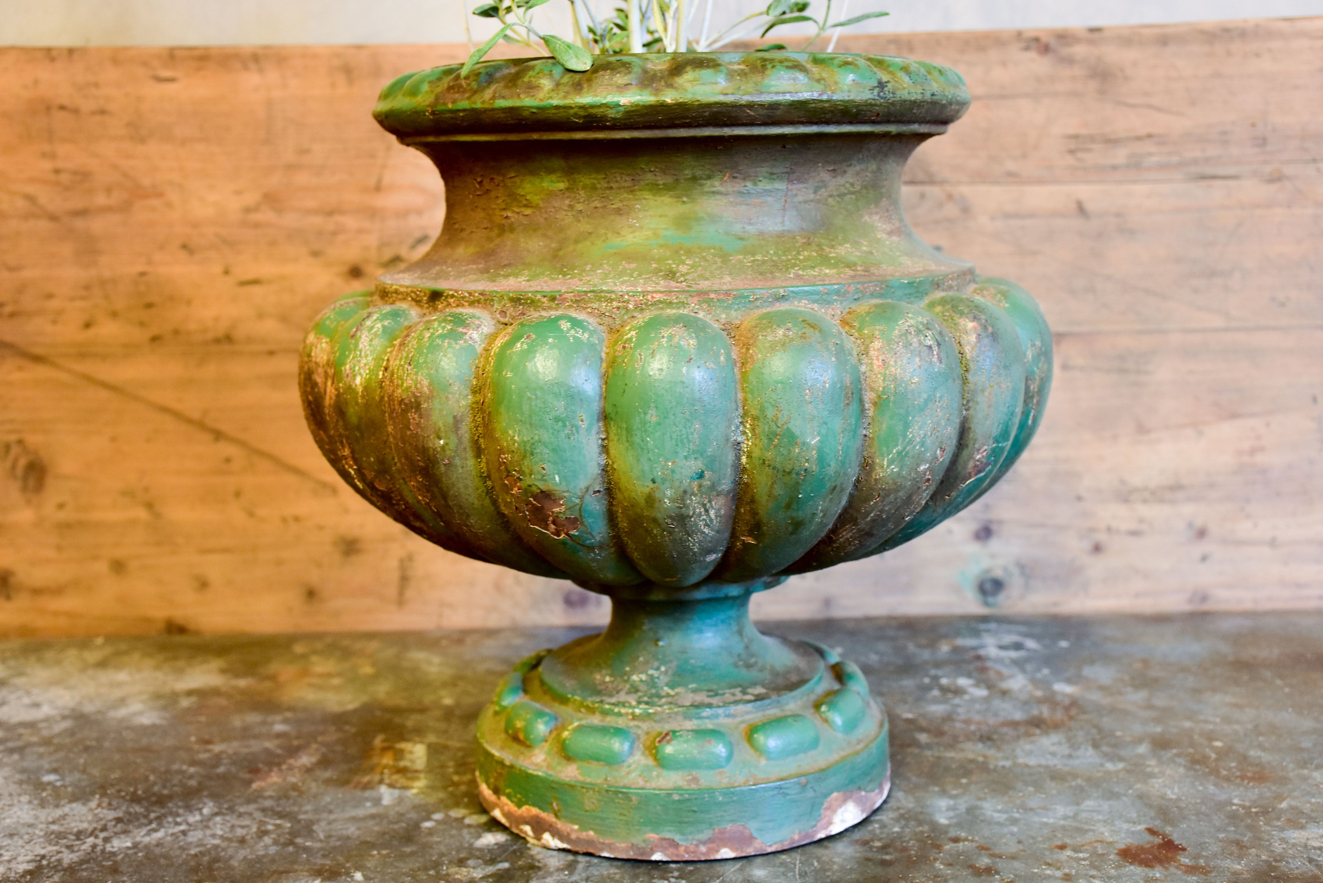 Antique French garden urn with green patina