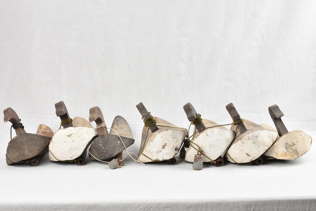 7 antique French wooden duck decoys