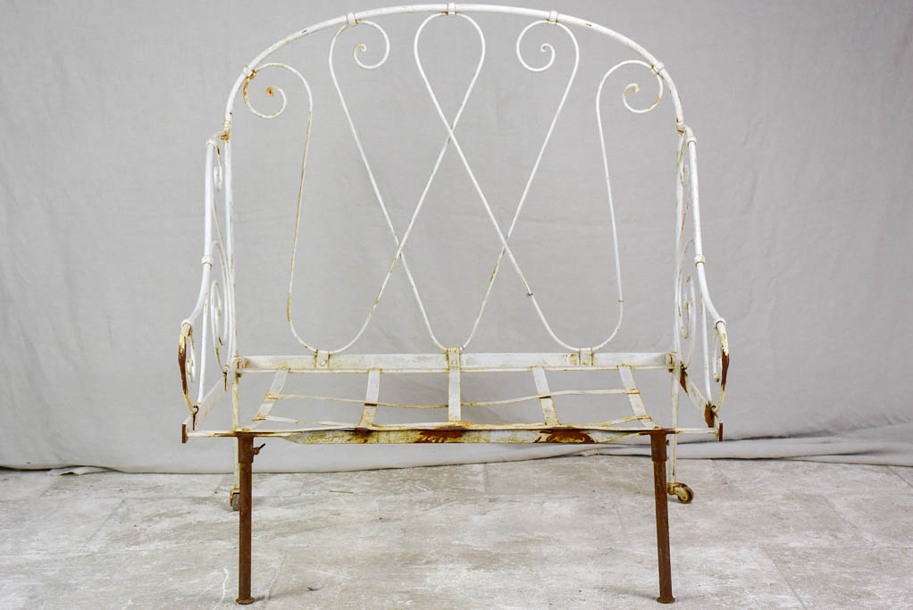 Antique French wrought iron folding armchair bed