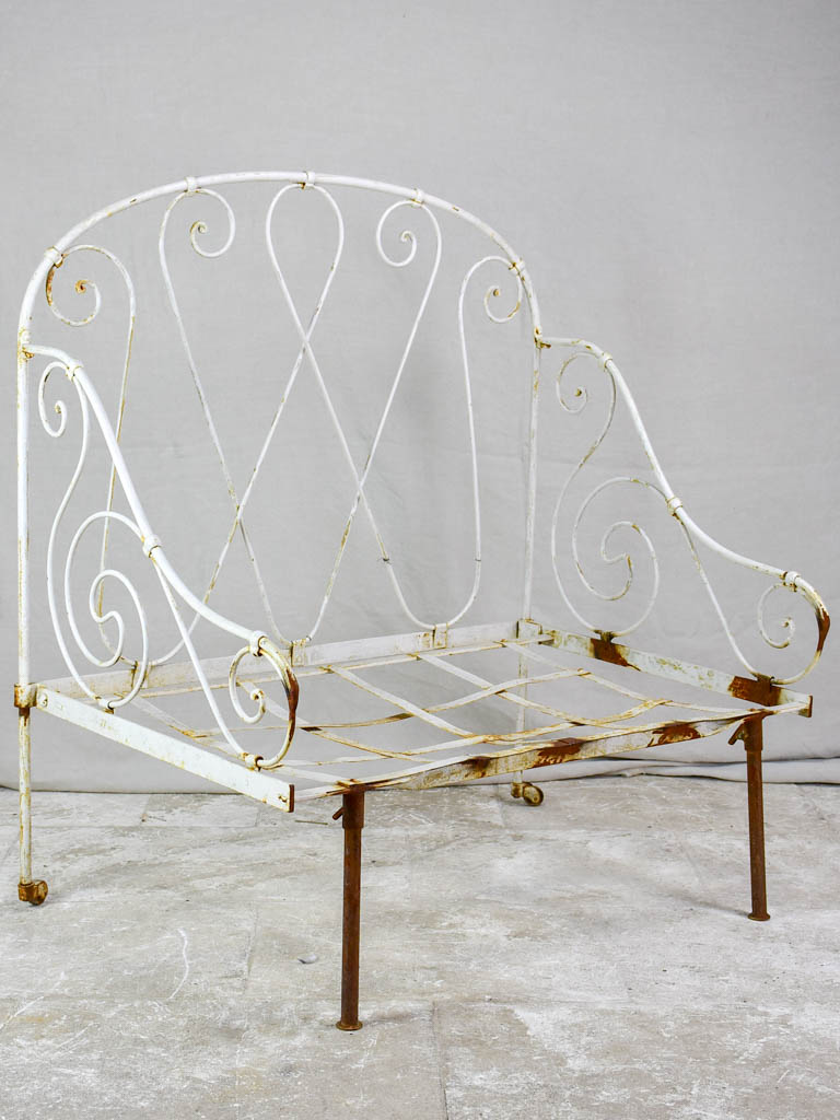 Antique French wrought iron folding armchair bed
