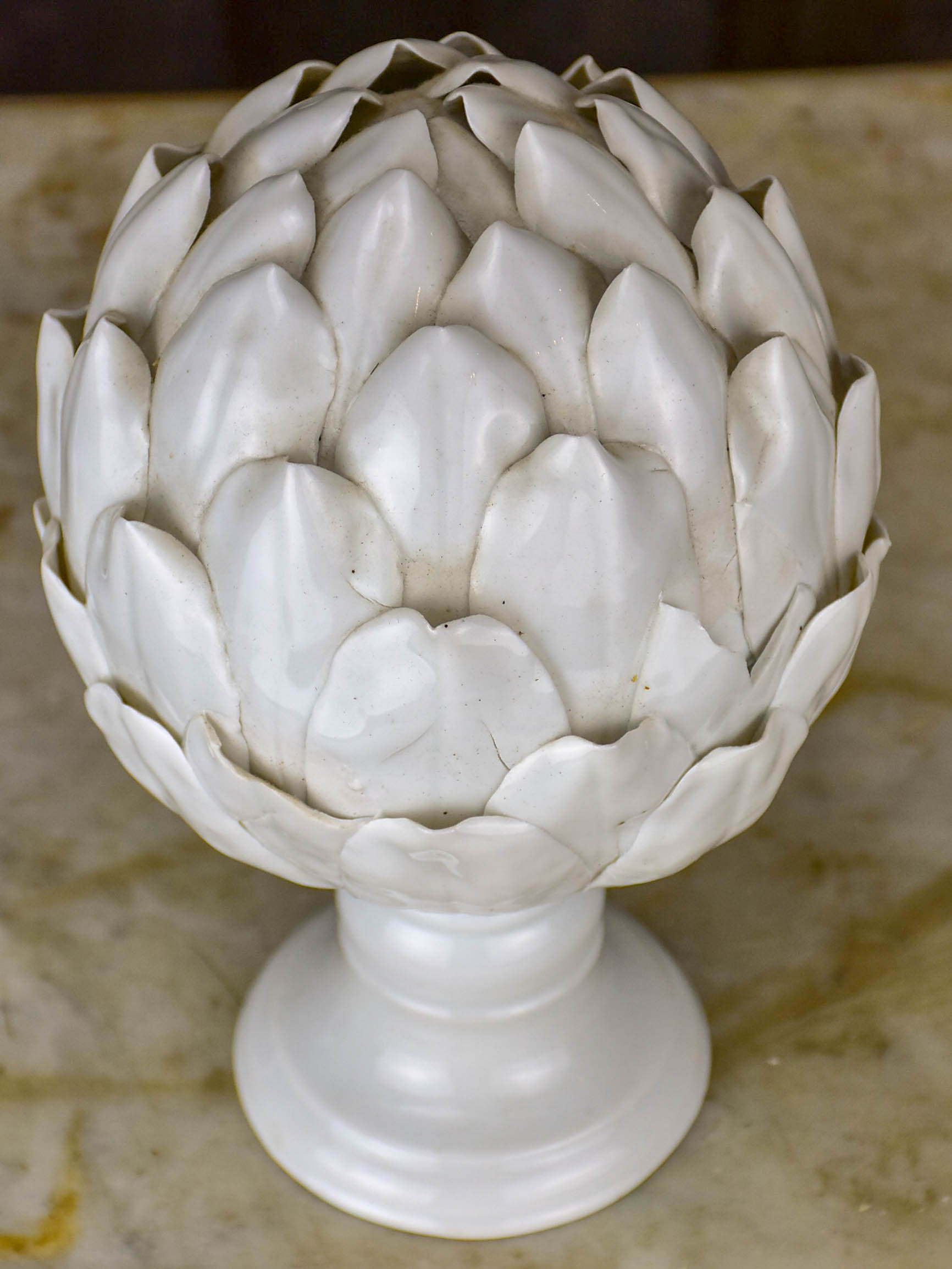 Two antique earthenware mounted artichoke sculptures