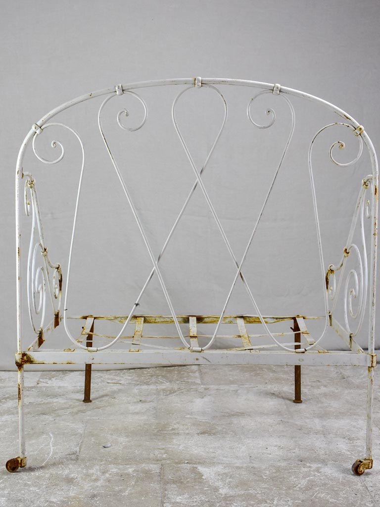 Antique French wrought iron folding armchair bed