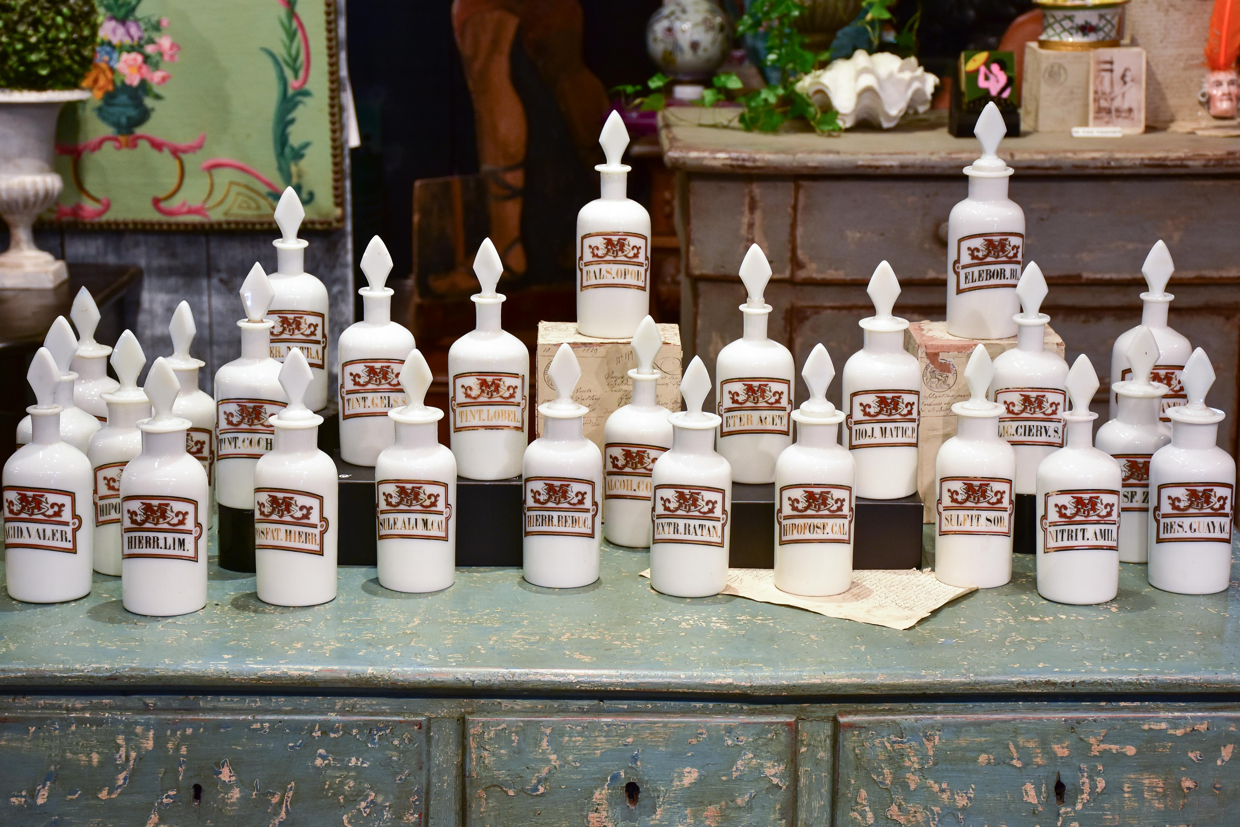 Set of 17 antique French opaline apothecary flasks