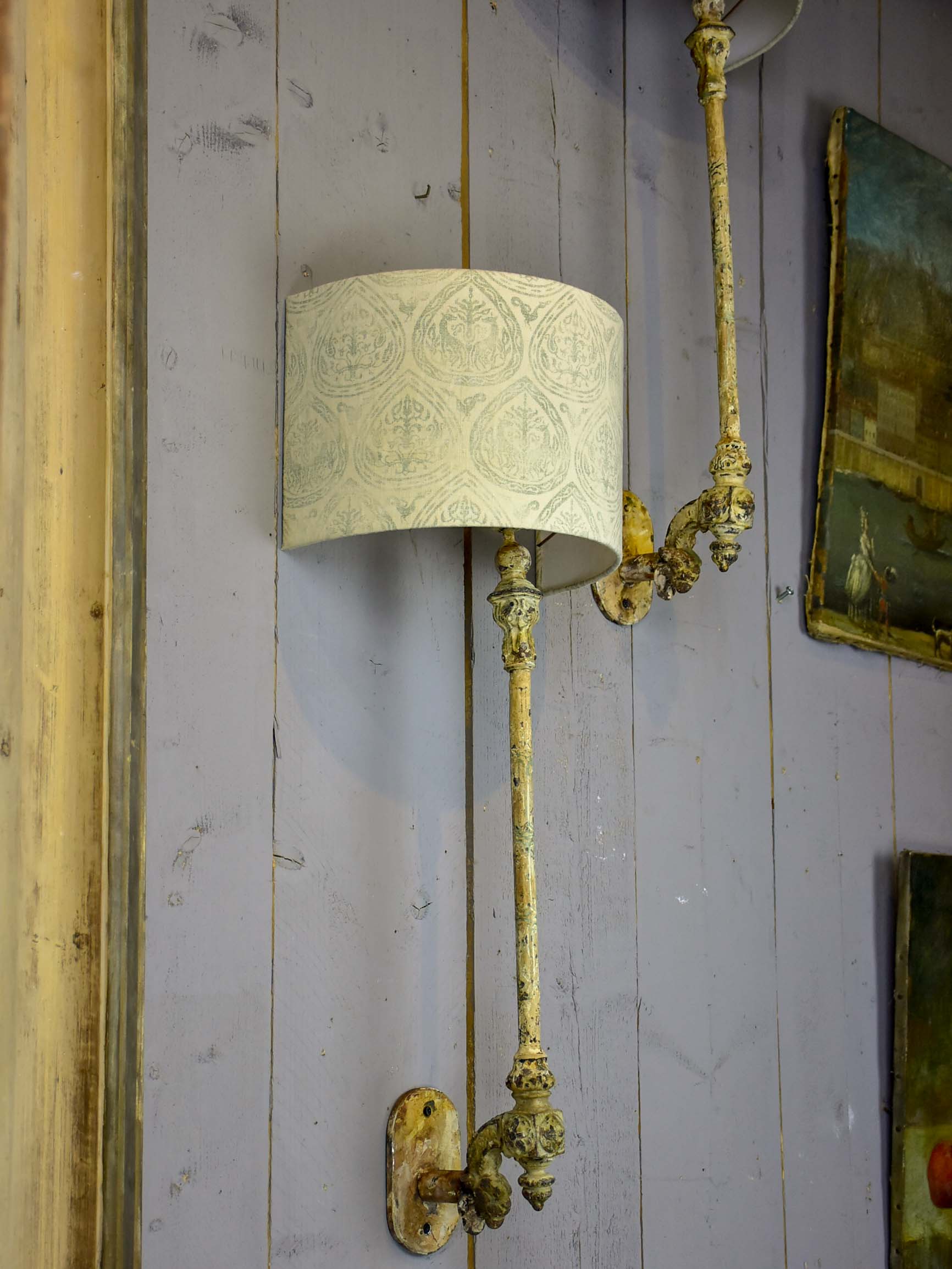 Pair of cast iron wall appliques made from salvaged balusters