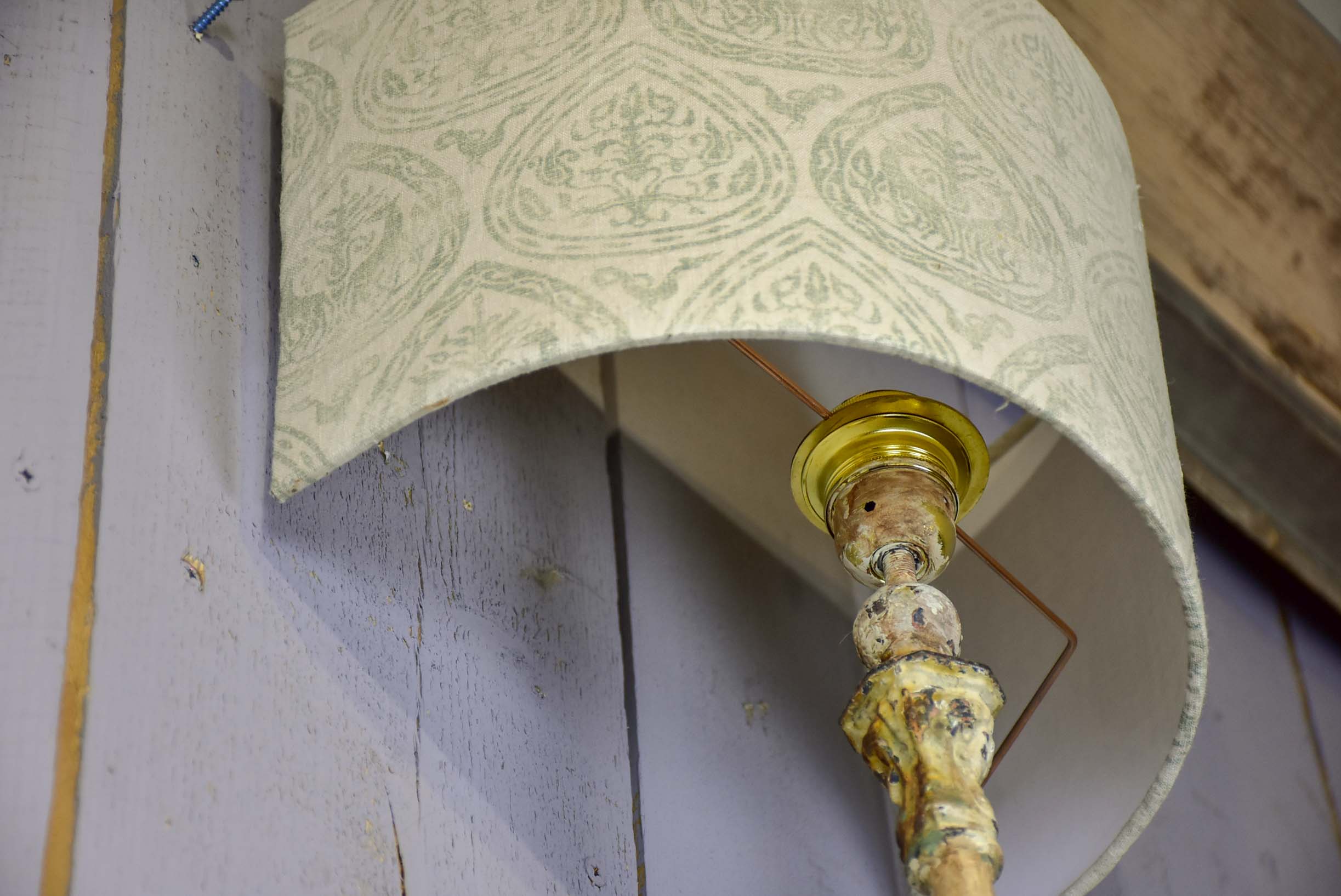 Pair of cast iron wall appliques made from salvaged balusters