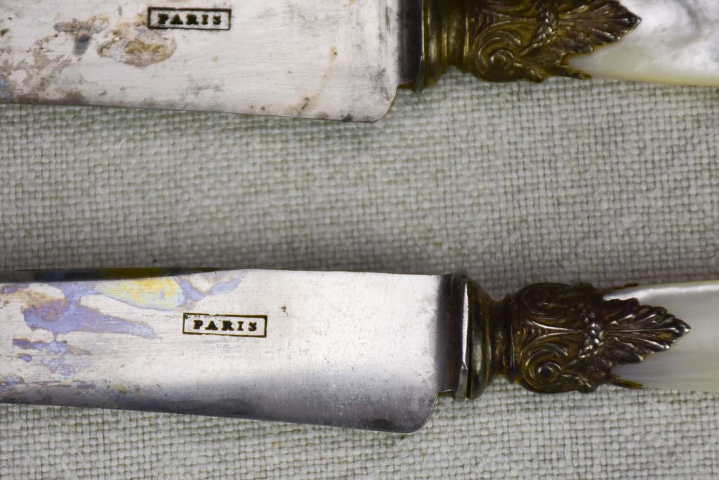 Set of 12 antique Parisian knives with mother of pearl handles and carbon steel blades