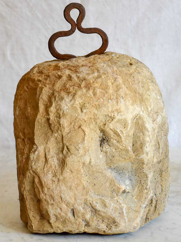 Antique French stone counterweight with iron handle