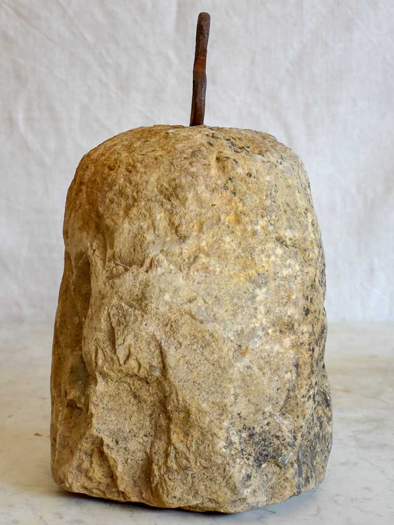 Antique French stone counterweight with iron handle