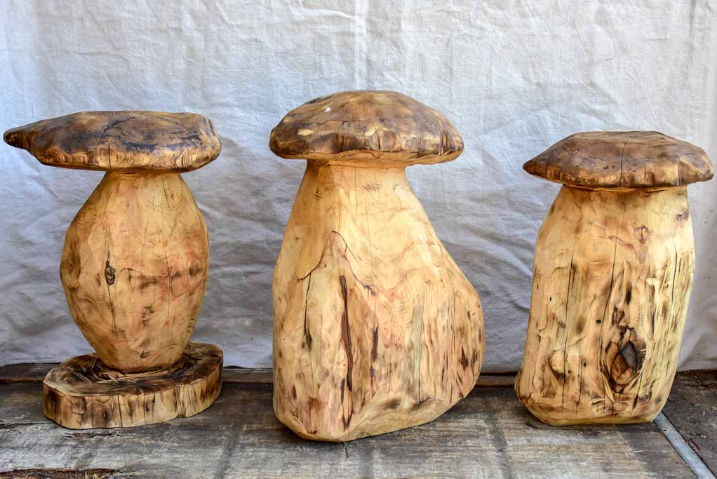 Collection of SEVEN artisan made garden stools - carved mushrooms / toadstools
