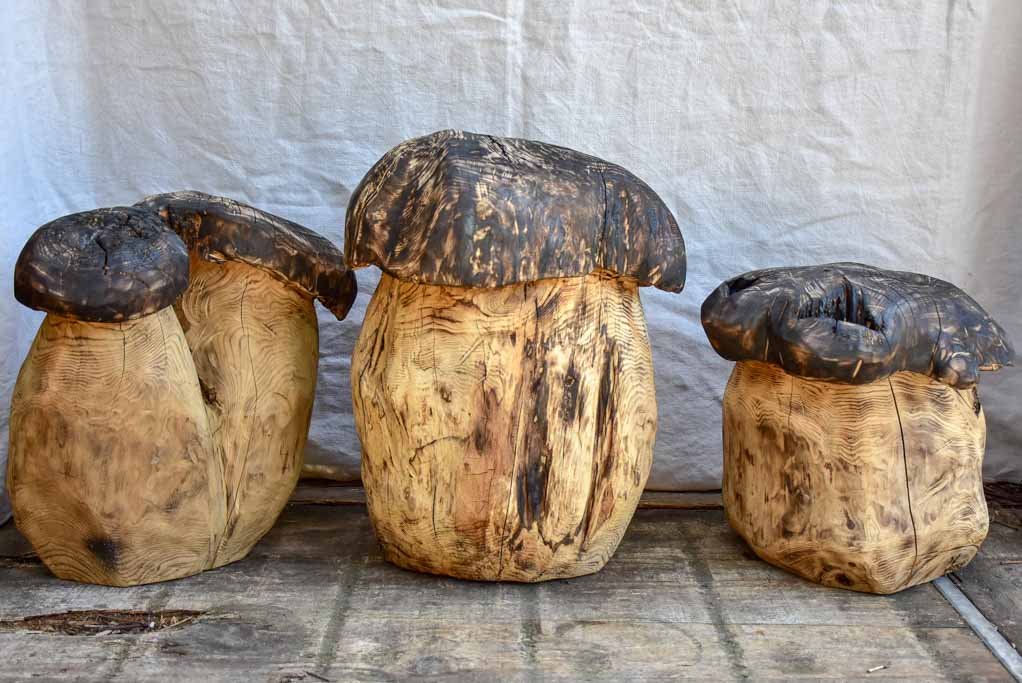 Collection of SEVEN artisan made garden stools - carved mushrooms / toadstools