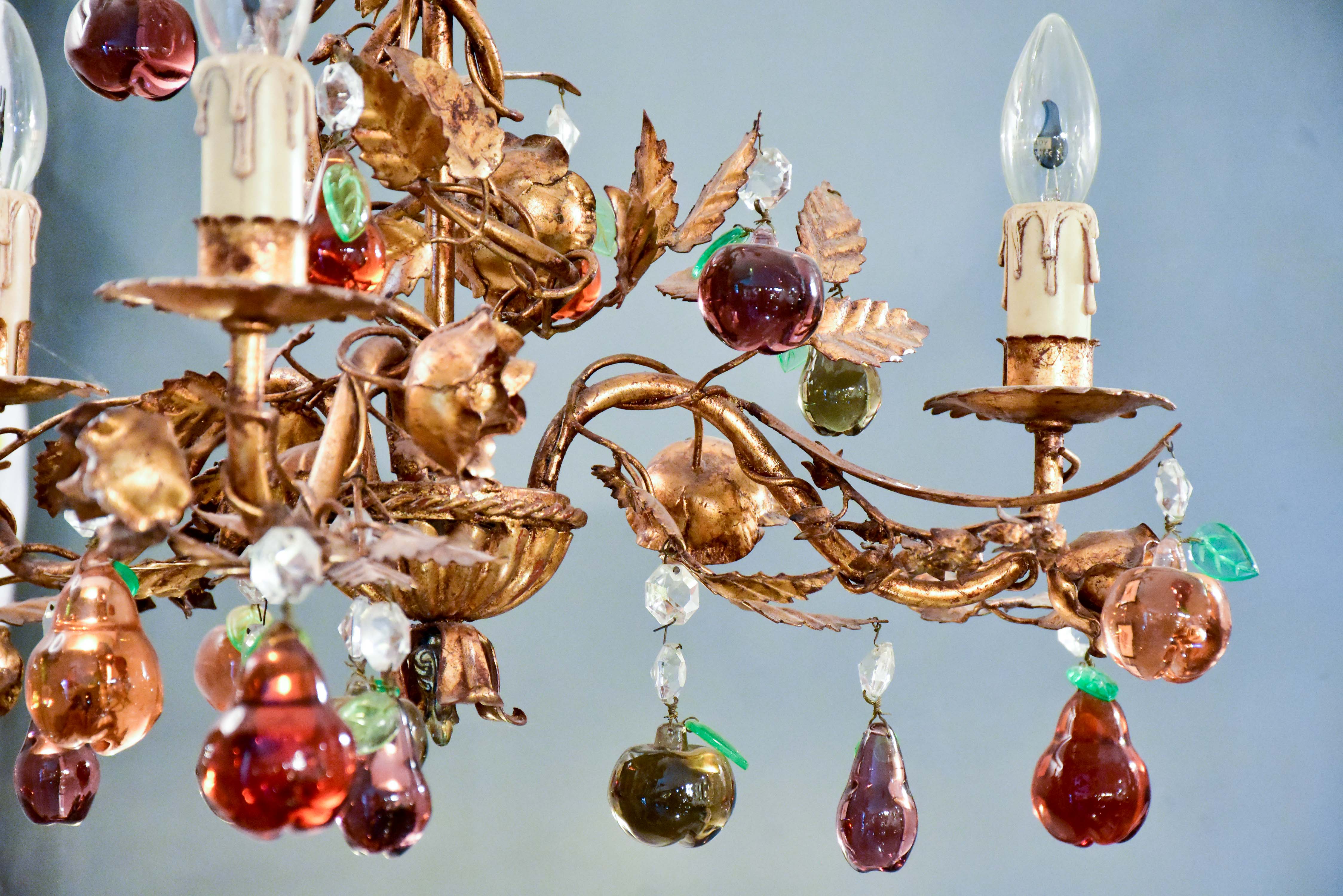 Vintage Italian chandelier with Murano glass fruits and a decorative gilded frame