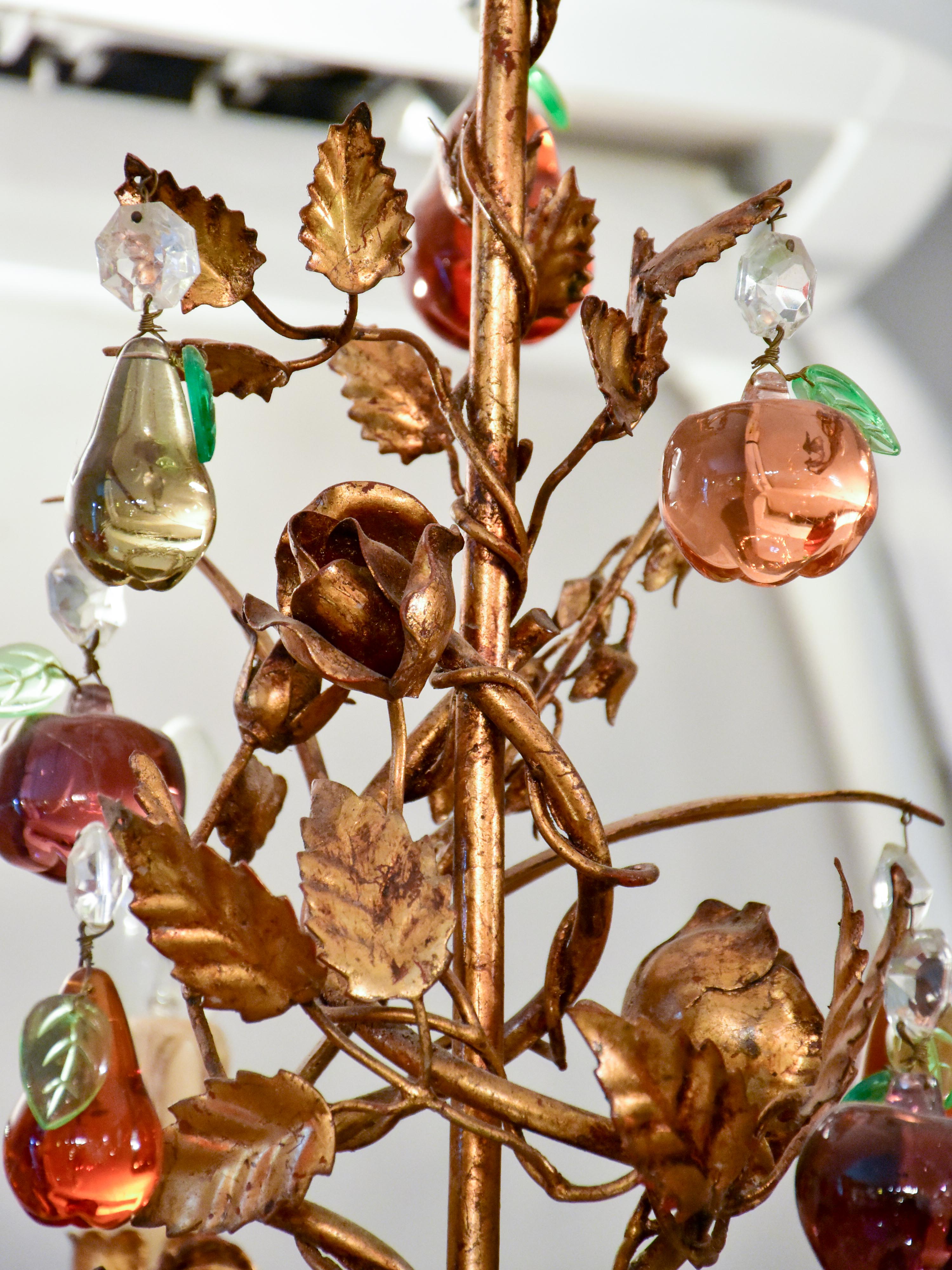 Vintage Italian chandelier with Murano glass fruits and a decorative gilded frame