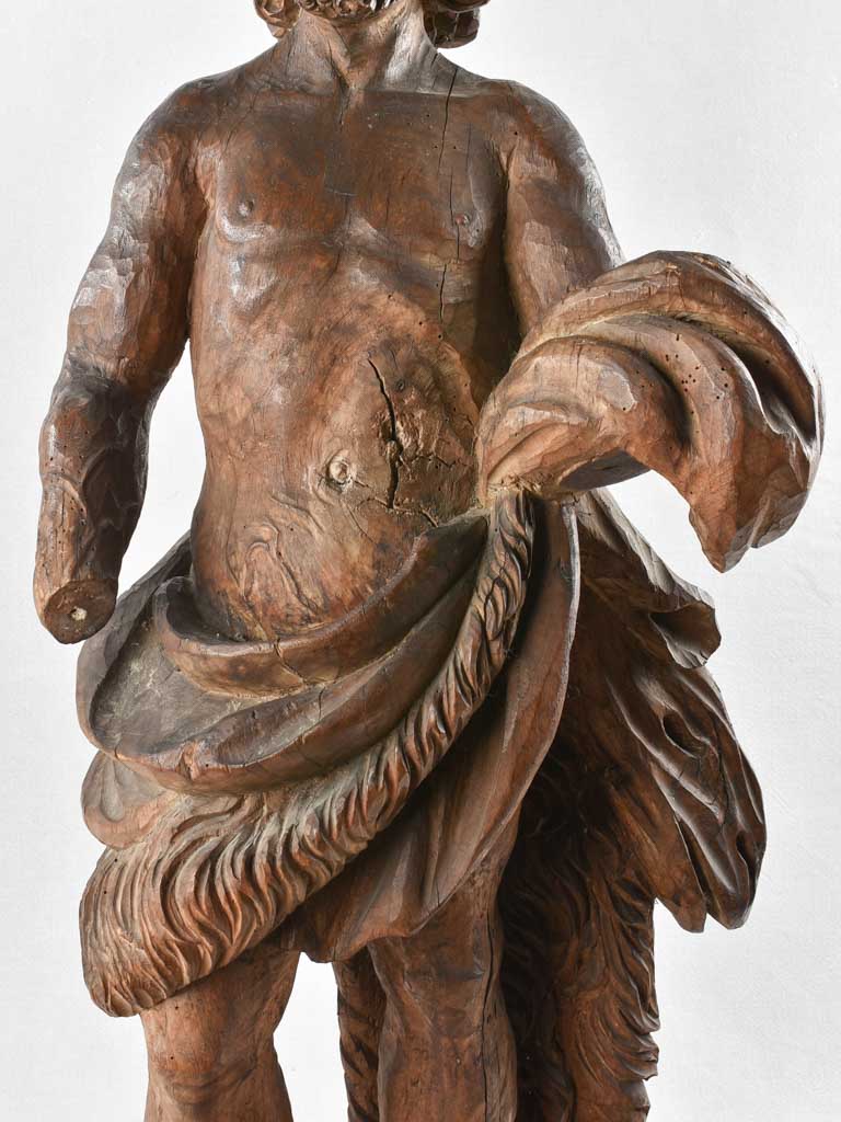 Distressed wooden John Baptist figure