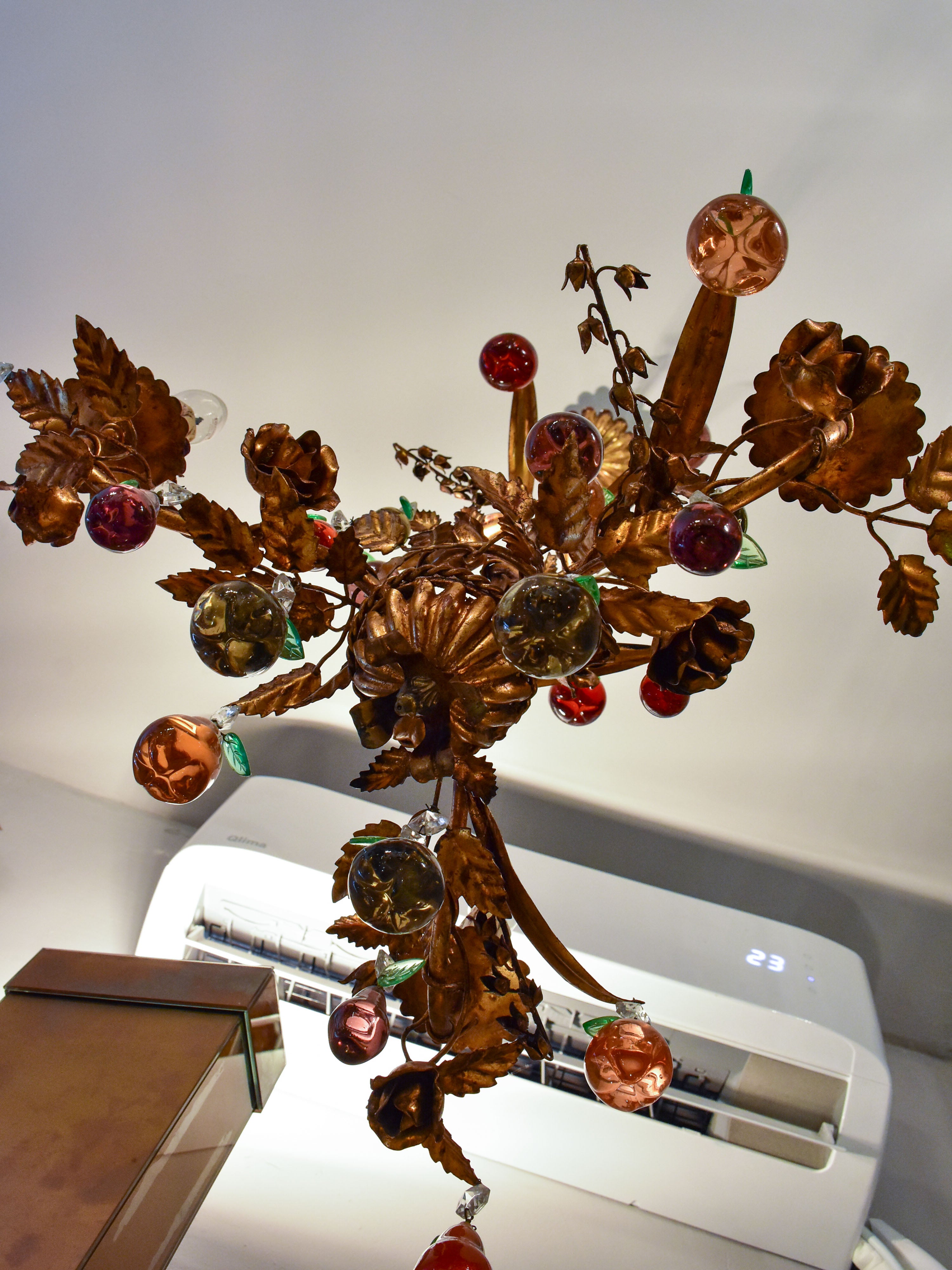 Vintage Italian chandelier with Murano glass fruits and a decorative gilded frame