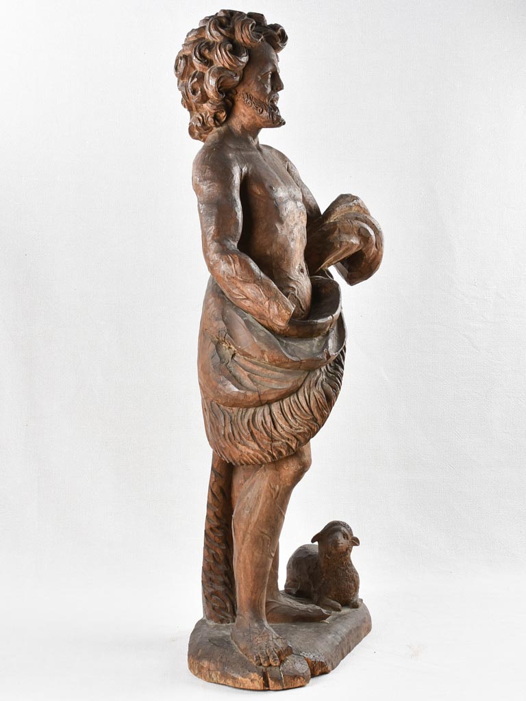 Antique religious artifact with lamb detailing