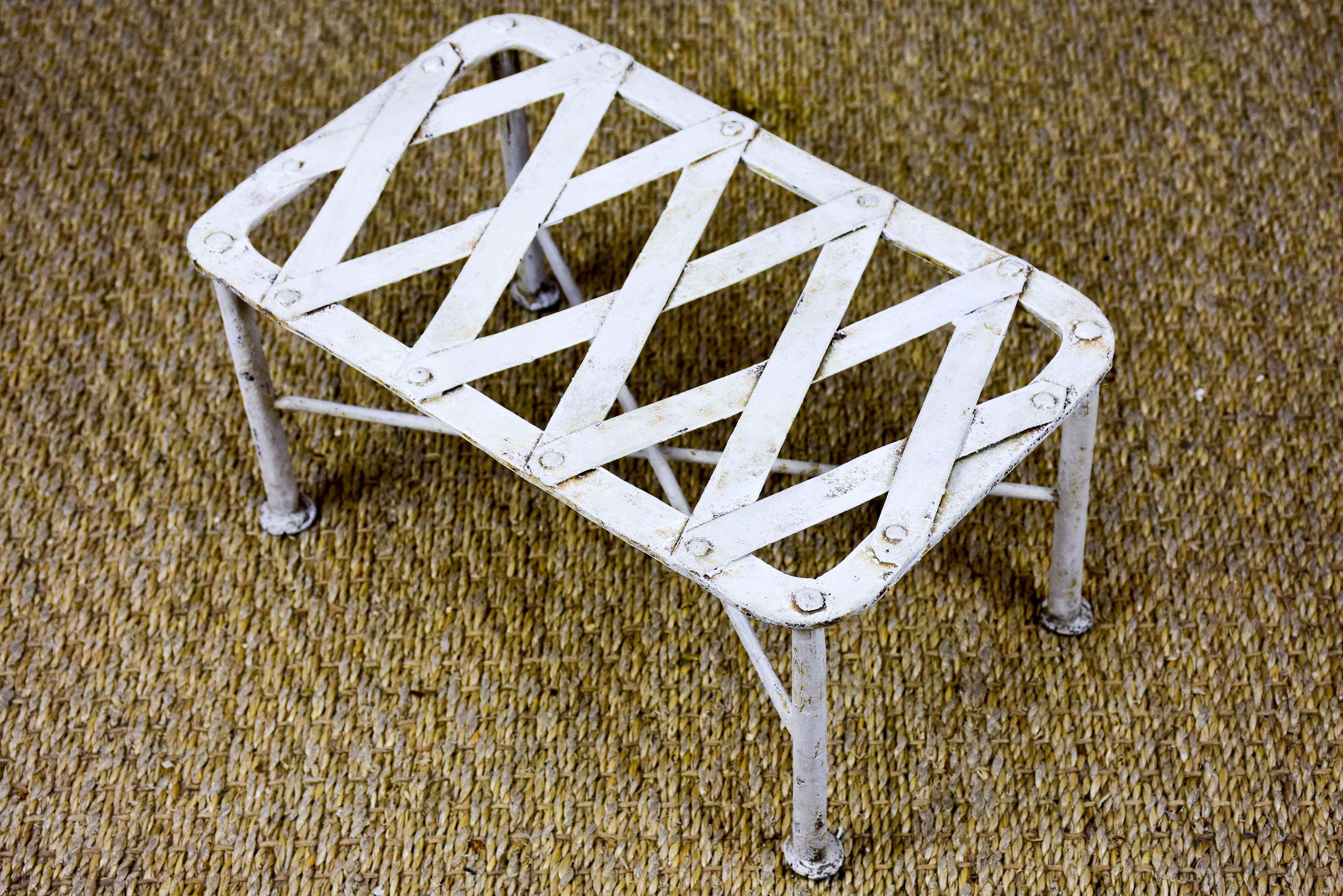 Antique French garden with footstool