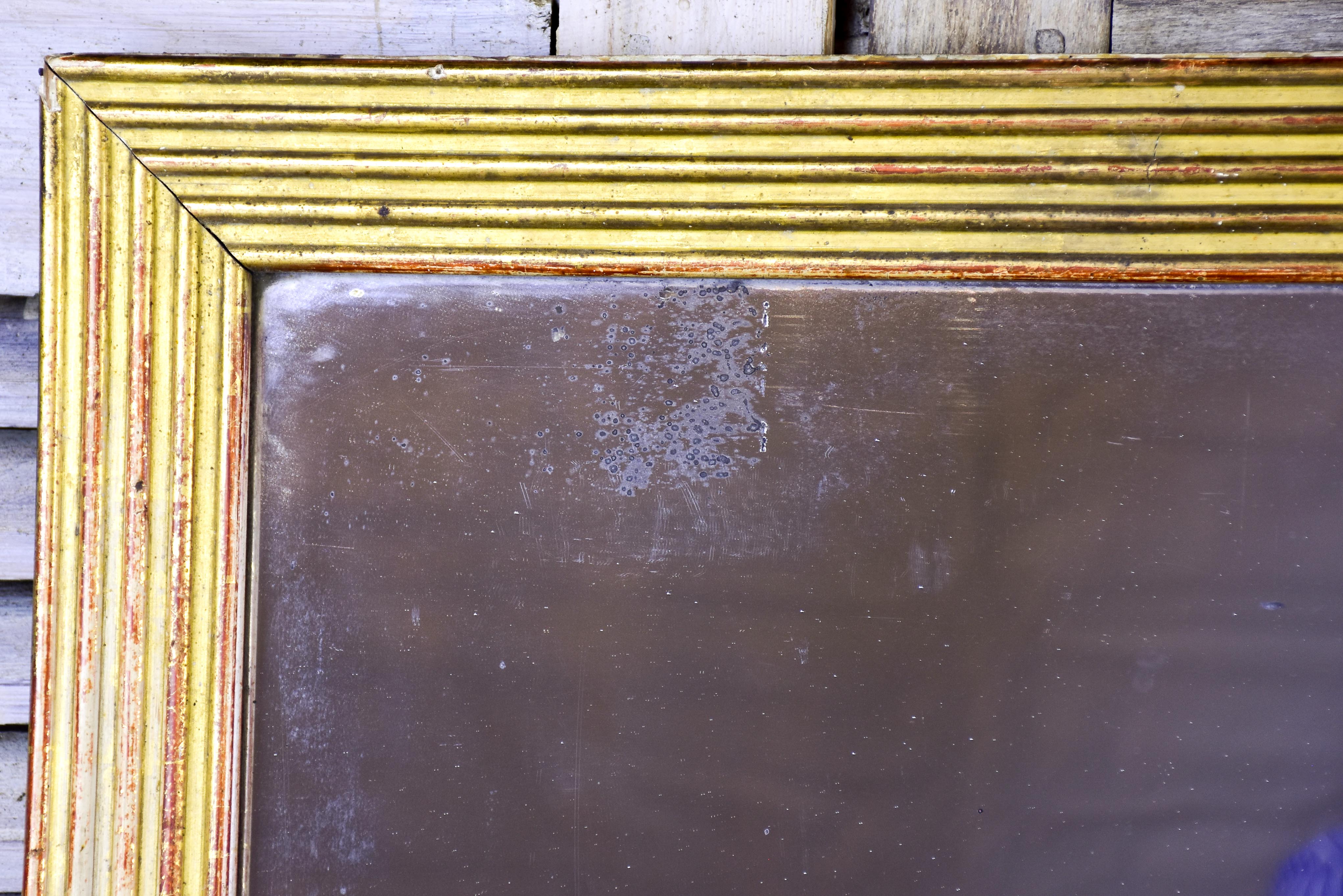 18th century Louis XVI giltwood mirror with reeded frame 33 ½'' x 32 ½''