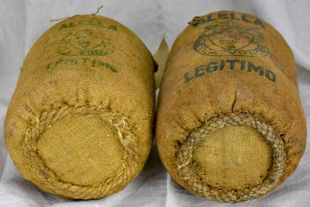Two 19th Century Spanish wine bottles in jute