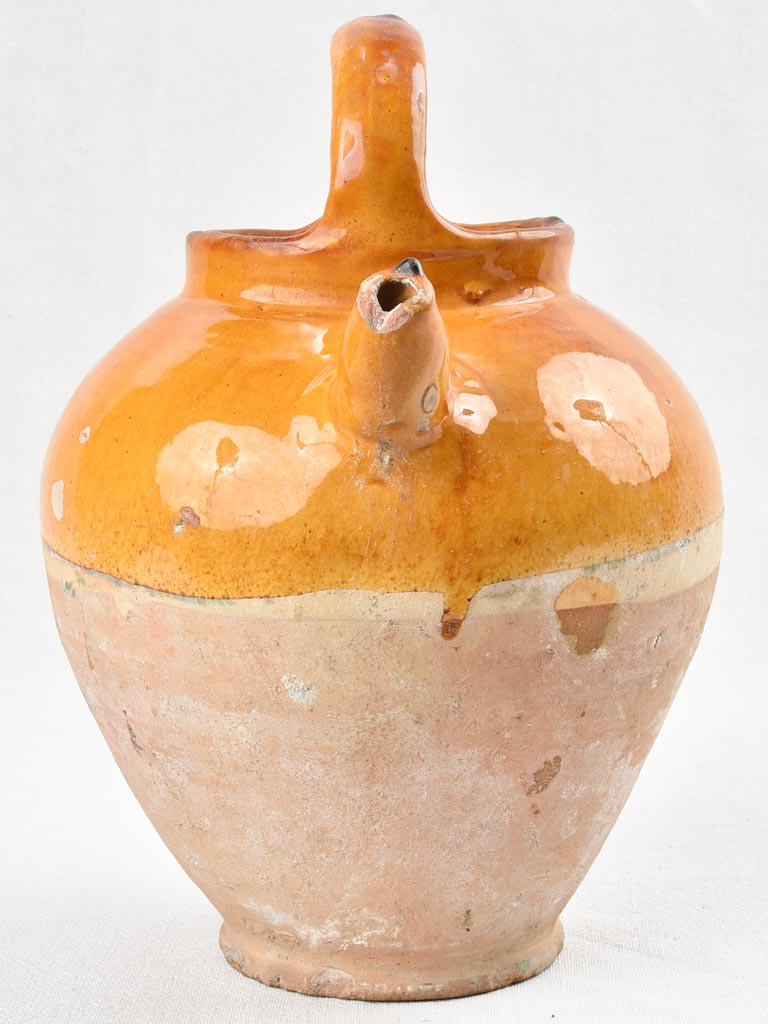 Yellow-glazed vintage French water pitcher