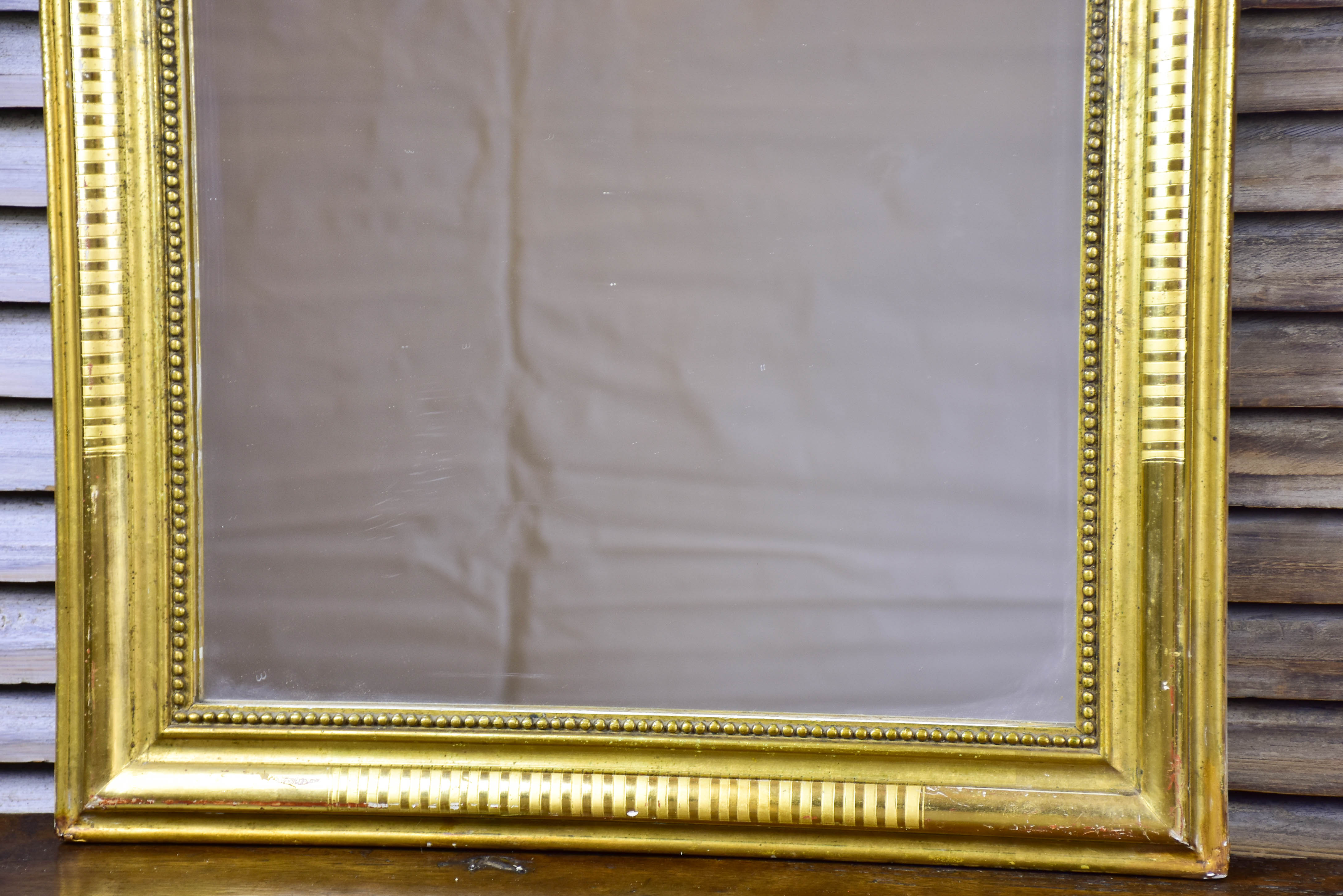 Antique French Louis Philippe mirror with gilded frame