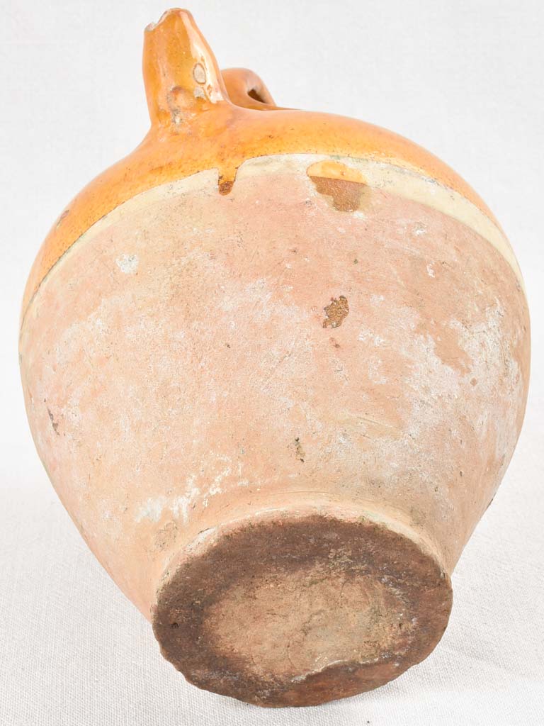 French antique yellow-glazed earthenware pitcher