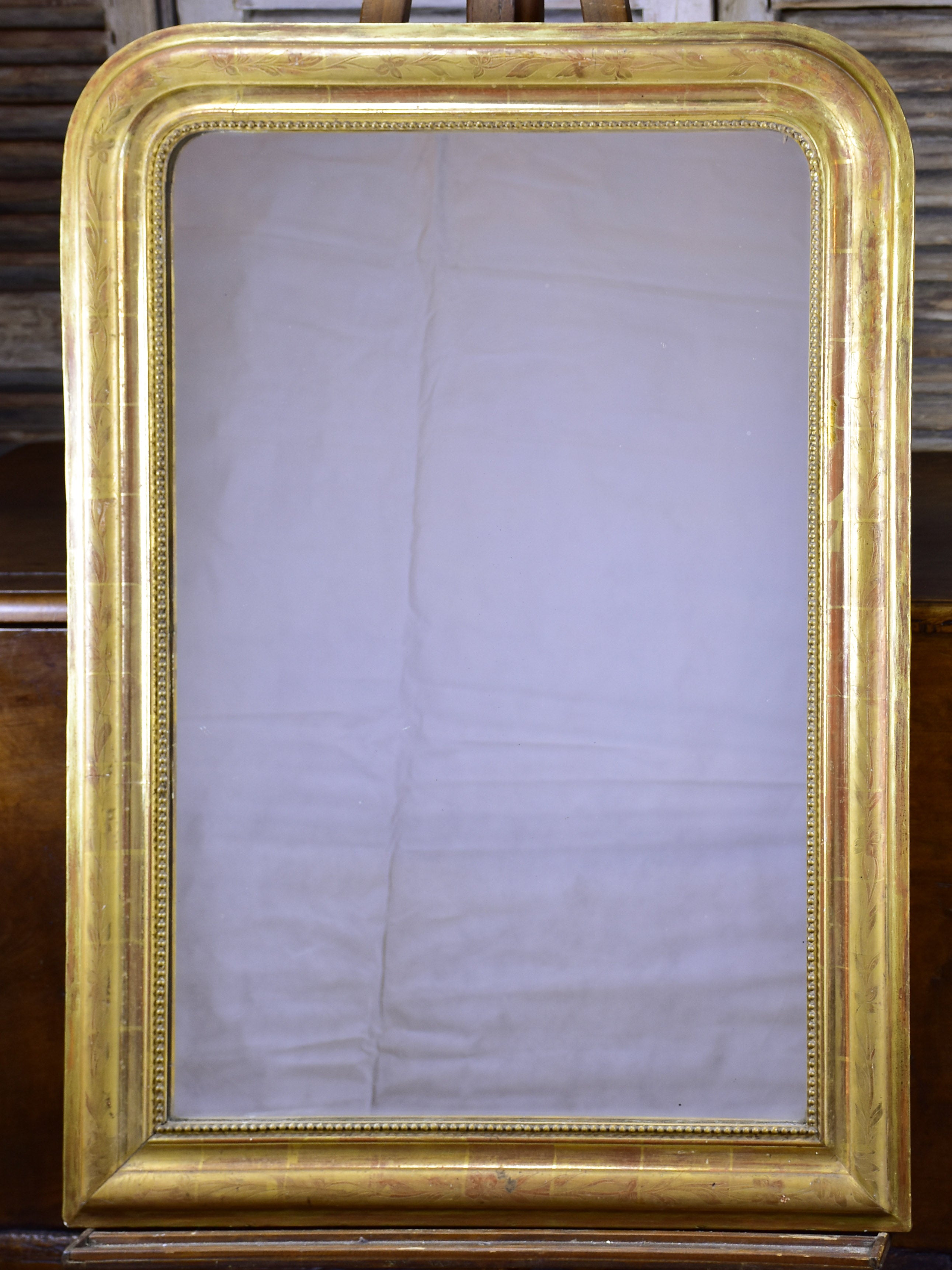 Antique French Louis Philippe mirror with gold frame
